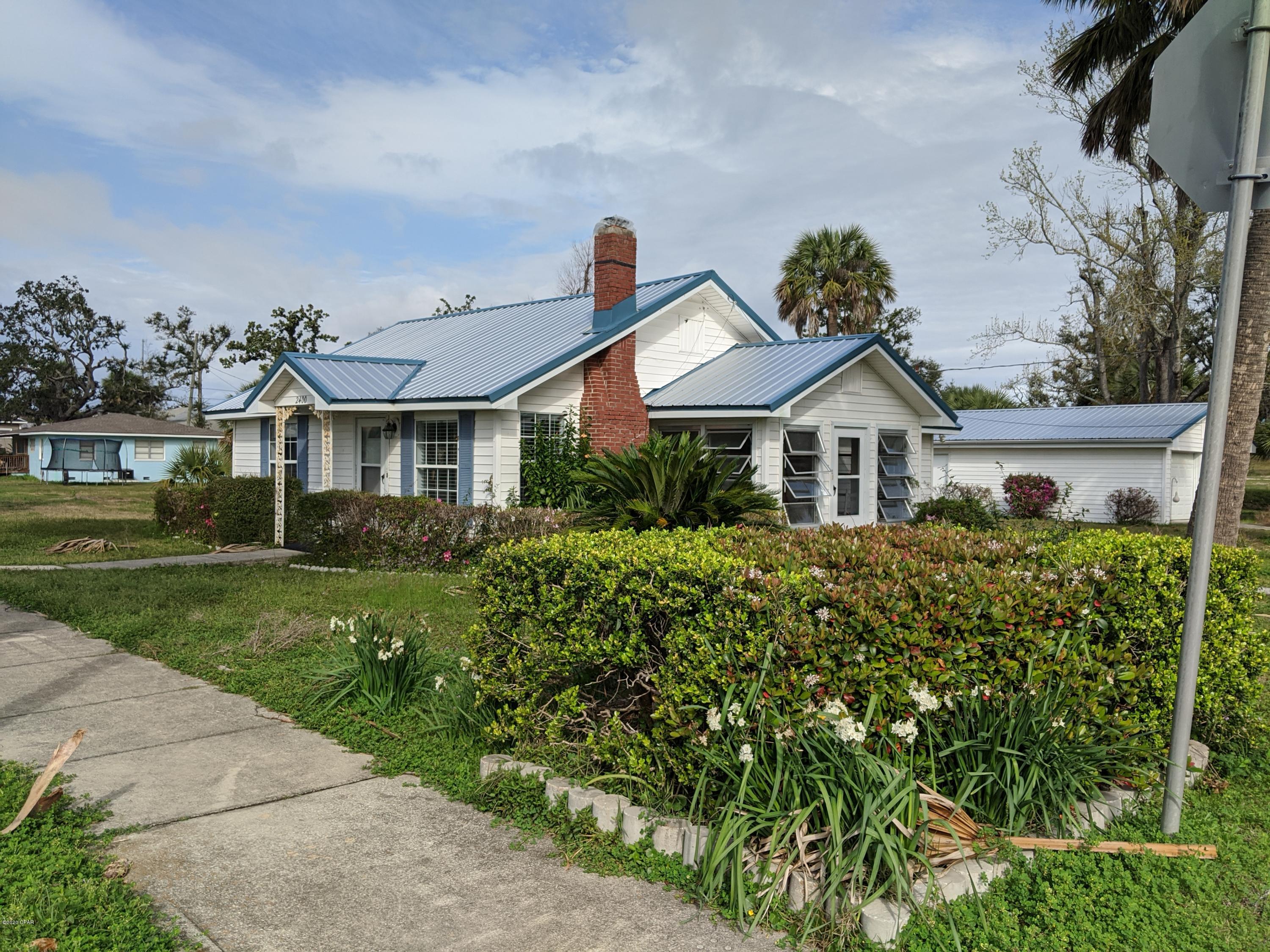St Andrews charmer waiting to be restored. Had hurricane damage and has been gutted on the inside. HUGE corner lot. Detached garage.