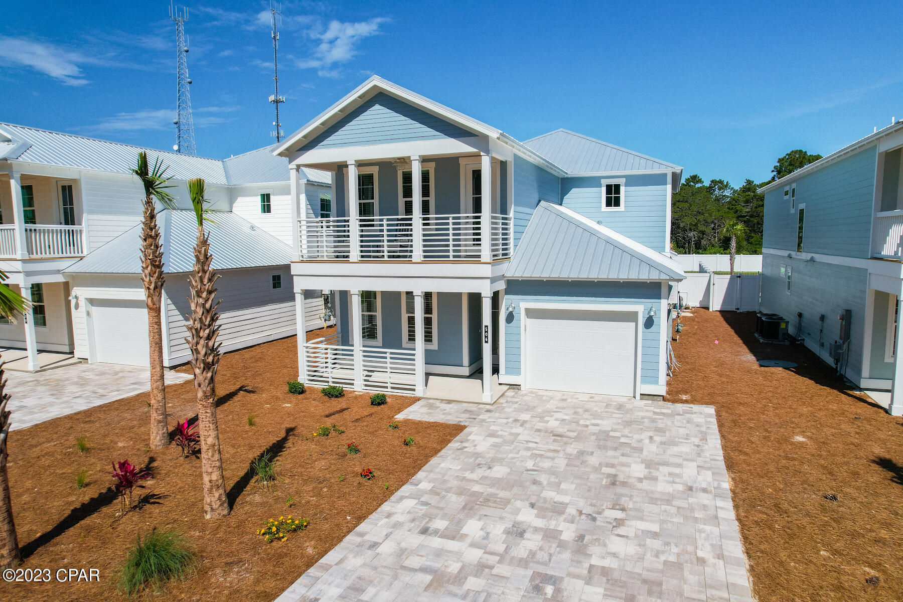 This brand new five- to six-bed home is the quintessential beach house with its coastal architecture and generous private pool. Splendidly located on a quiet residential street just a couple blocks from the beach, it has rental projections of just under $200,000 annually for those looking for above-average returns. The private fenced yard is a cool oasis for chilling out around the gunite pool with family and friends. There's ample space by the pool for lounge chairs, barbecues and fun. After a day in the sun, relax in front of the huge flat-screen TV in the custom living room or draw up a stool and share drinks and gossip at the kitchen bar. Everything is pristine and brand new, from the quartz countertops and stainless appliances to the washer and dryer. The home includes a spacious dini dining room, large master suite with pool views and a second bedroom with access to the guest bath. Head upstairs where there's a fitted bunk room for six, a second king bedroom with ensuite and a queen bedroom with balcony. The sixth bedroom is currently laid out as a playroom/TV den with a sleeper sofa and big-screen TV. The home boasts ample parking, a garage for storing beach chairs and bikes and is in an amazing location in Panama City Beach. White sandy beaches, putt-putt courses, the county pier, local restaurants and the fabulous Shipwreck Island Water Park are just a short walk away. Whether you're looking for a vacation home or investment rental, this could be the perfect choice.