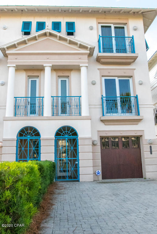 his location is one of the most sought after in the Highly desirable Delos Development. With 3 levels of breathtaking views. Located on the Gulf of Mexico. Boasts 10' ceilings with crown molding and private beach access. The first floor has a summer bunk room as well as a large suite that boasts an outdoor inset hot tub overlooking the Gulf. And sunset views that some could only dream of Also has a rare low maintenance all concrete construction with a rental cash machine of 158k at 50% owner occupied. New air conditioners and recently updated. Sleeps up to 14