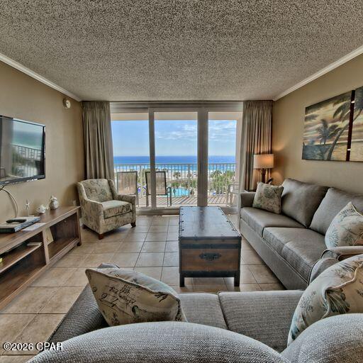 Dunes of Panama B406 is a beautiful 2 Bedroom, 2 Bath Condo with 1,050 sq ft of space to unwind, relax and enjoy direct Gulf views!  Beach front living awaits and it is ready to be utilized as a turnkey vacation rental or a second home. Currently on the UMB Vacations Rental Program and includes a set of beach chairs already paid in full for the season!  The Dunes of Panama Resort has 1500 linear feet of sugar white sand, 3 gulf front pools (one heated), four pickle ball courts, one tennis court, free WI-FI, DirecTV streaming, fitness room, shuffleboard, outdoor BBQ grills, Stingray's restaurant and gift shop and the Sneaky Tiki poolside. All Milestone report repairs are completed and ALL assessments have been paid! All dimensions and information herein are deemed reliable but should be verified by buyer.