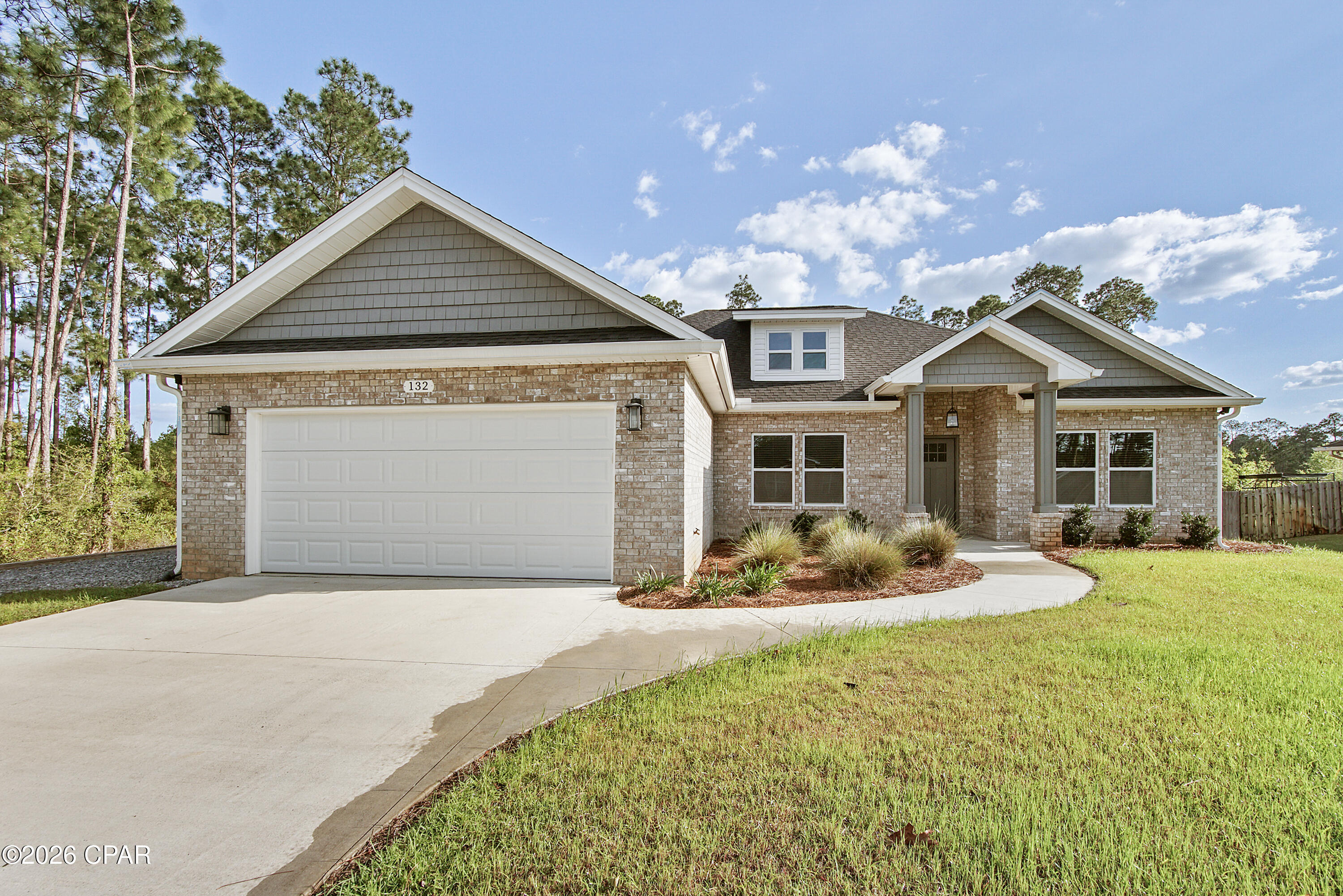 CURRENTLY UNDER CONTRACT, SELLER WILL CONSIDER BACKUP OFFERS. If you've been waiting for a large property on almost an acre (.80) that actually checks all the boxes, this is it! From the moment you walk in, you'll notice the seamless LVP flooring flowing throughout (bathrooms tile), leading into a spacious living room designed for both relaxing and entertaining. The kitchen is a standout with quartz countertops, lots of cabinetry, a pantry, and a dedicated dining area that makes everyday living feel effortless. The split floor plan offers privacy, with a large primary suite featuring tray ceilings and a spa-like bathroom complete with a beautifully oversized tiled shower, double vanity, and walk-in closet. Step outside and it only gets better. Enjoy a screened-in patio plus an extended patio space with a pergola and sunshades perfect for year round gatherings. There's even a gas hookup ready for your grill. Need space? You've got it. A massive 48x38 pole barn with both concrete and gravel flooring, a fully fenced and cleared lot, RV/boat parking, generator wiring, propane lines, and a dedicated slab already in place. The well house is fully equipped with a water softener system, filters, and extra storage. This property isn't just a home, it's a setup for the lifestyle you've been wanting. Bring your toys, your plans, and your vision. There's room for it all here.