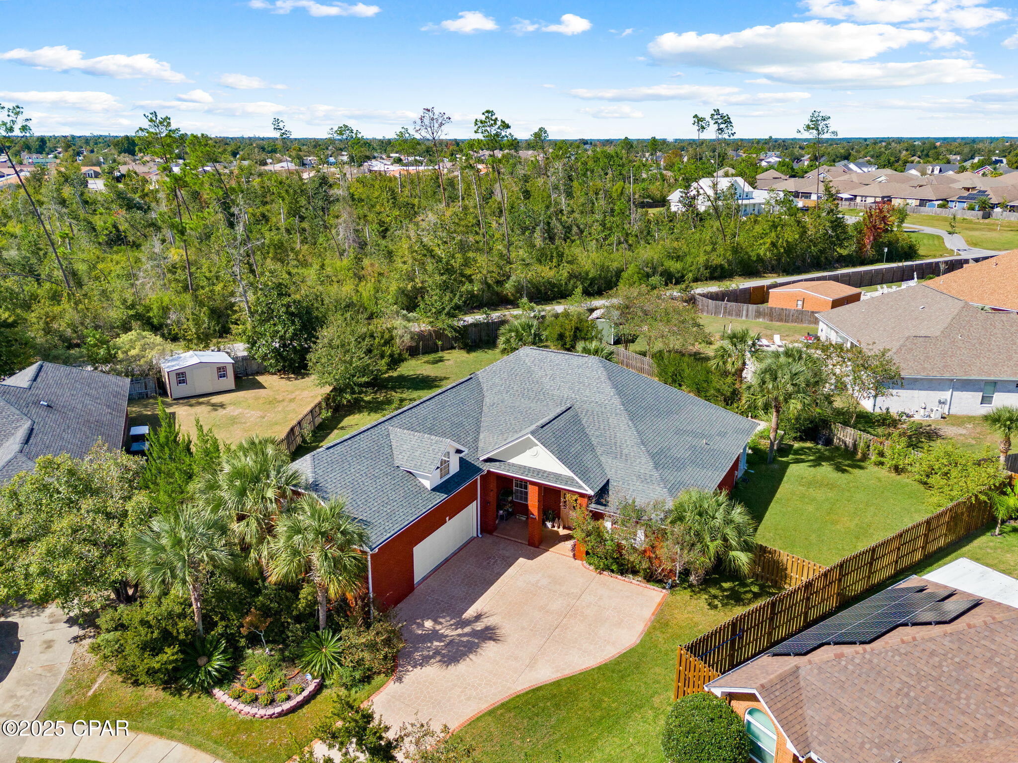 Welcome to The Landings, one of Lynn Haven's most desirable neighborhoods—located right next door to Nature Walk Golf Course and convenient to Panama City, Tyndall AFB, and Bay Haven charter schools. This spacious home offers more than 3,000 square feet with a thoughtfully designed split-bedroom layout featuring 4 bedrooms and 4 full bathrooms.
Inside, you'll find two inviting living areas, a fully equipped kitchen with breakfast bar, pantry, and adjoining breakfast nook, plus a separate dining room perfect for family gatherings. The large master suite includes an en suite bath with whirlpool tub, separate shower, and dual vanities for added comfort.
One of the additional bathrooms opens directly to the screened pool area, ideal for entertaining or relaxing outdoors. Enjoy large covered porches on both the front and rear of the home, and a privacy-fenced backyard for added seclusion.
Upstairs, a bonus room over the garage provides flexible space for a fourth bedroom, recreation room, or home office—complete with its own bathroom and closets. The oversized double garage offers extra room for storage, hobbies, or a small workshop. Graham Lane offers possible secondary access behind the property.
This home combines generous living space, functional design, and outdoor enjoyment—ready for its next owner to call it home.