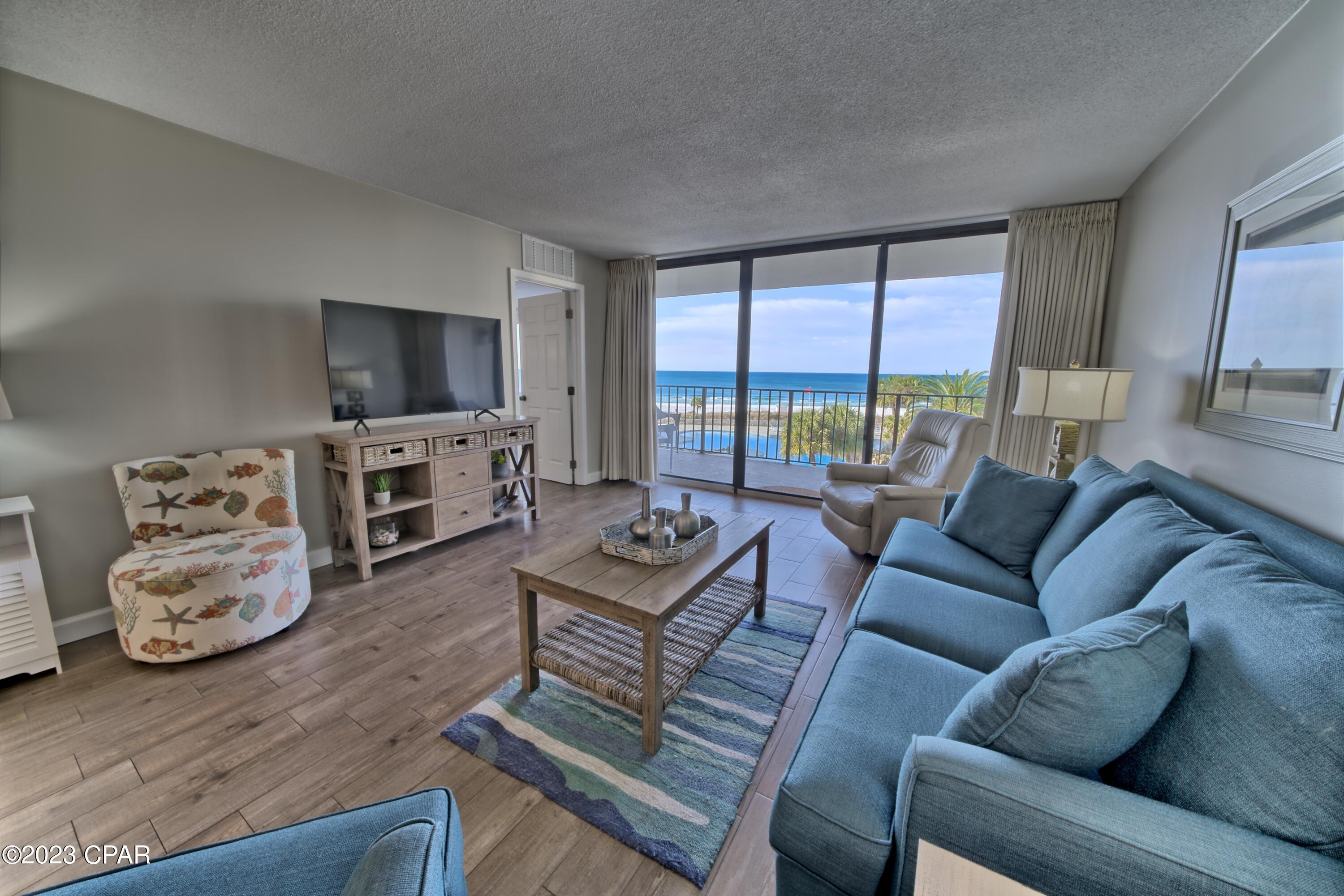 ****BEAUTIFULLY RENOVATED**** THIS HIGHLY DESIRABLE EDGEWATER 1 bedroom 2 bath DELUXE  FLOOR PLAN has an oversized GULF FRONT MASTER BEDROOM and OVERSIZED BALCONY. The condo has been BEAUTIFULLY  RENOVATED with the following upgrades, wood look tile throughout, freshly painted, gourmet kitchen with s/s appliances, under & over cabinet lighting, upgraded doors & hardware, bathroom showers, enclosures, plumbing & lighting fixtures, custom window coverings, beautiful furniture & accessories and the list goes on and on!!. Edgewater  Resort has UNSURPASSED AMENITIES which include a Tropical Lagoon pool, hot tubs, Oceans Restaurant & Bar, Fitness Center, Golf, Tennis and much more. Edgewater is conveniently located in the heart of PCB close to shopping, dining, entertainment and more! heart of PCB located close to shopping, dining, entertainment & more!.