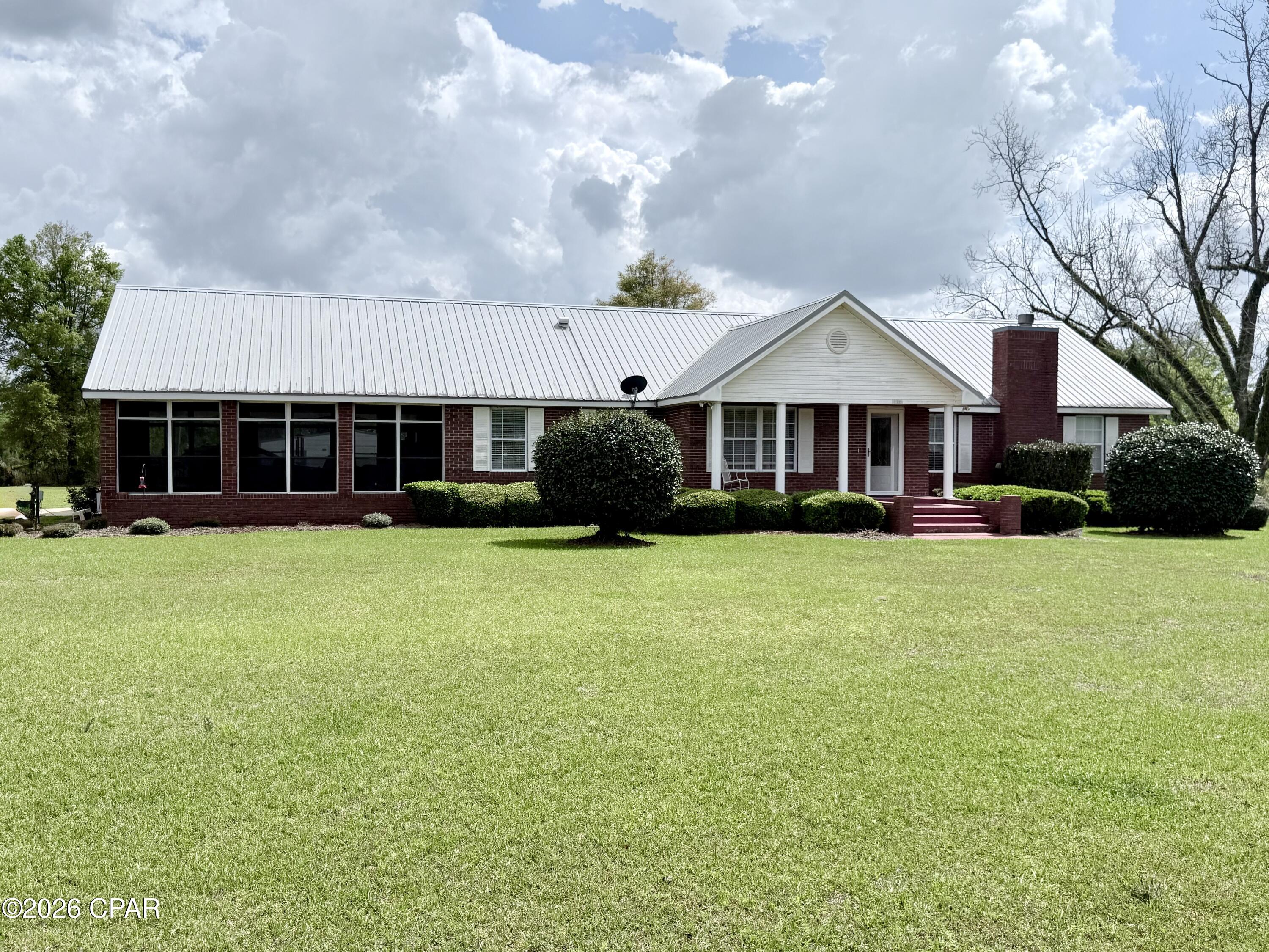 Warm & Inviting Country Home Full of Charm

Welcome to this charming brick home nestled on a quiet country dirt road, surrounded by peaceful farmland and open space. From the moment you arrive, you'll feel the warmth and comfort this inviting 3-bedroom, 2-bath home has to offer.

Inside, original hardwood floors add timeless character. The spacious  living and dining area create the perfect place for gathering with family and friends. The sunroom/covered porch offers a cozy spot to relax, sip your morning coffee, and take in the beauty of country living.  The home shows in public records that the house was built in 1954, but renovations and additions were completed in 1997.  

Situated on approximately 2.7 acres, there's plenty of room to create your dream garden, keep a few farm animals, or simply enjoy the privacy and space. With its blend of charm, comfort, and room to grow, this home is truly a special place to settle in and make your own. 

 ADDITIONAL ACREAGE CAN BE PURCHASED AT  $5,000. PER ACRE TO MAKE IT APPROXIMATELY 15 TOTAL ACRES. 

It's so inviting, you will feel like you are home when you walk in!