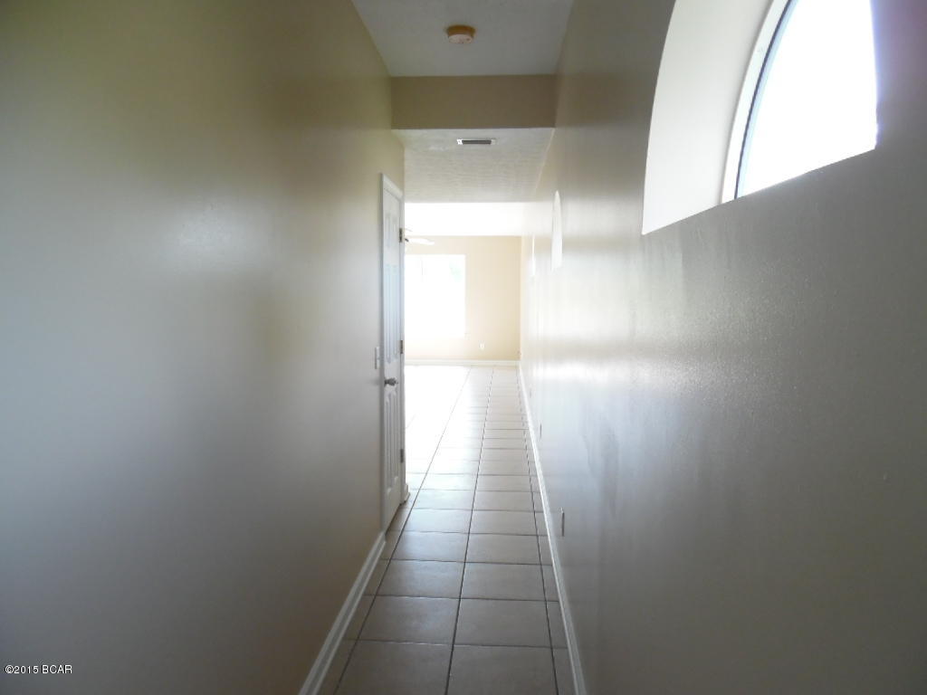 Nice large 2 story home on a corner lot. This 3 bed 2 1/2 bath home has new appliances, new interior paint and carpet. A bonus area at the top of the stairs could be used as a computer room. Very nice subdivision ''Palm Cove'' close to Pier Park and within a half mile to the beach. This Seller will offer an allowance up to $500 to owner occupant Buyer's purchase of a home warranty of their choice. ADDITION to normal Buyer closing costs, Buyer pays Doc Stamps on the Deed, closing service fee of $250, electronic recording fee of $27. If asking for closing cost assistance the maximum considered is 3% of the purchase price for owner occupants. Closing cost assistance cannot go towards transfer taxes (doc stamps on the deed) assoc., transfer fees, or any prepaid expenses. Investor sales are not elig. for buyer closing costassistance. All High Bids will be subject to Seller's approval and the Seller reserves the right to reject any bid.