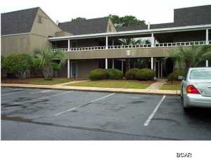 BEAUTIFUL ground-floor Bay Point condominium overlooking the Harbour and Marina! This unit has a spacious living/dining area that is open to the kitchen for great views. The Master bedroom features laminate wood floors and a full bath with dressing area. Off the back of the unit is a screened porch to enjoy those sunsets! This unit is being sold unfurnished. Unit is being sold in its AS IS condition.
