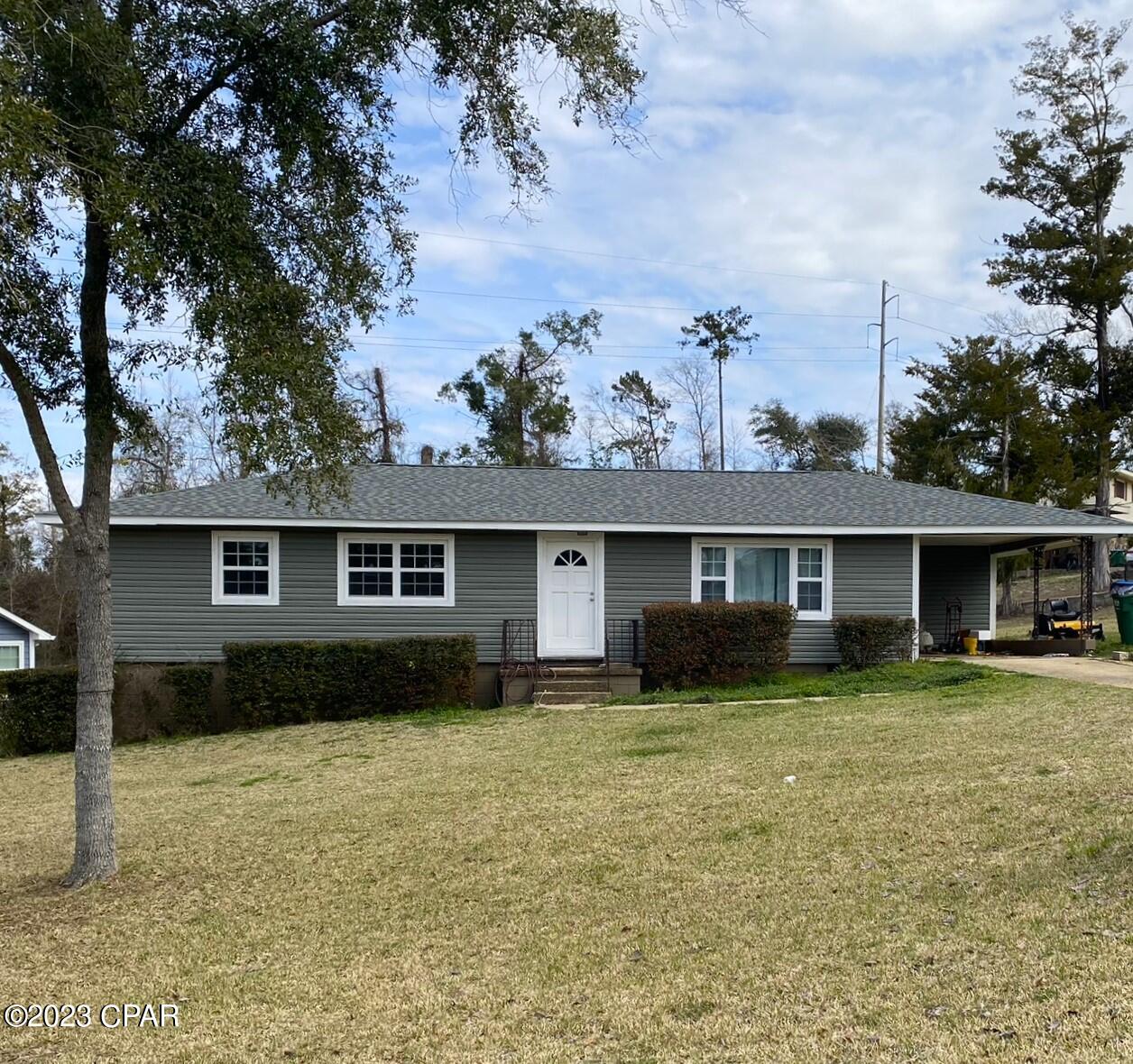 Beautifully renovated home in downtown Marianna, FL. It features two large living spaces with large windows allowing plenty of natural lighting , three large bedrooms with the master having his and her closets, a large kitchen/dining room. The kitchen has brand new cabinets, counter tops , and appliances. The main bathroom has been completely renovated with a new vanity, tub and tiled surround. The original hardwood floors have been professionally refinished. The home has a new roof, a new AC unit, a new hot water heater, and all new vinyl siding and paint on the outside. It offers plenty of storage with all the built-in features and hallway closets. Marianna is a beautiful quaint small city with great schools, shopping, Florida Caverns, and just great country living!!