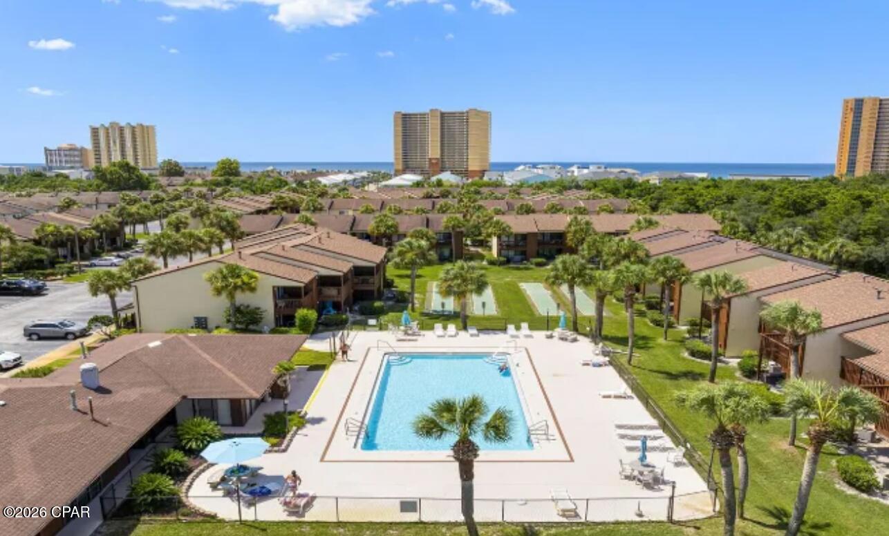 Price Improvement - Now Offered at $265,000! Private Beach Access ,End Unit .Nature Preserve Views. Welcome to 17751 Panama City Beach Parkway, Unit 9F-an end-unit townhome ideally located in the desirable west end of Panama City Beach. Just a short walk along the private boardwalk leads to the Gulf's sugar-white beaches, offering the perfect blend of coastal lifestyle and convenience.
This end unit is uniquely positioned overlooking a peaceful nature preserve, providing added privacy and open green space rarely found in townhome communities. Enjoy outdoor living with a private balcony off the primary bedroom and a covered patio off the main living area-perfect for relaxing and enjoying coastal breezes. Inside, the home features a functional layout with two full bathrooms (one upstairs and one downstairs), a galley-style kitchen with gas stove, and bright living and dining areas filled with natural light.
Located in Beachwalk Condominiums, residents enjoy amenities including a community pool, tennis courts, and private beach access via boardwalk. The HOA covers cable, lawn maintenance, exterior pest control, garbage service, and pool care, providing a low-maintenance lifestyle. Conveniently located near dining, shopping, and approximately one mile from Pier Park, this property is well-suited for full-time living, a second home, or an investment opportunity. A pre-listing inspection has been completed, and the seller is addressing select items identified in the report. Schedule your private showing today and take advantage of this price improvement on a well-located end unit in Panama City Beach.