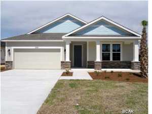 Beautiful new construction home in new Whisper Dunes Phase 2B subdivision. This home features a Mako floor plan with a Carolina elevation. A Samuel Taylor built home includes standard features such as designer carpet in main areas and bedrooms, 8 ft. 2 panel craftsman interior door package, brushed nickel fixtures and faucets throughout, insulated (R19) interior common walls and insulated (R38) ceilings, and durable Sherwin Williams premium interior wall paint. Kitchen features stainless steel appliance package (range, dishwasher, & microwave) and oversized 36'' wood cabinetry with crown molding, and granite counter tops. Full bathrooms include raised vanity heights, large tile flooring in bathrooms and laundry rooms, 2 x 6 Exterior Wall Construction, and hurricane tie down rod
