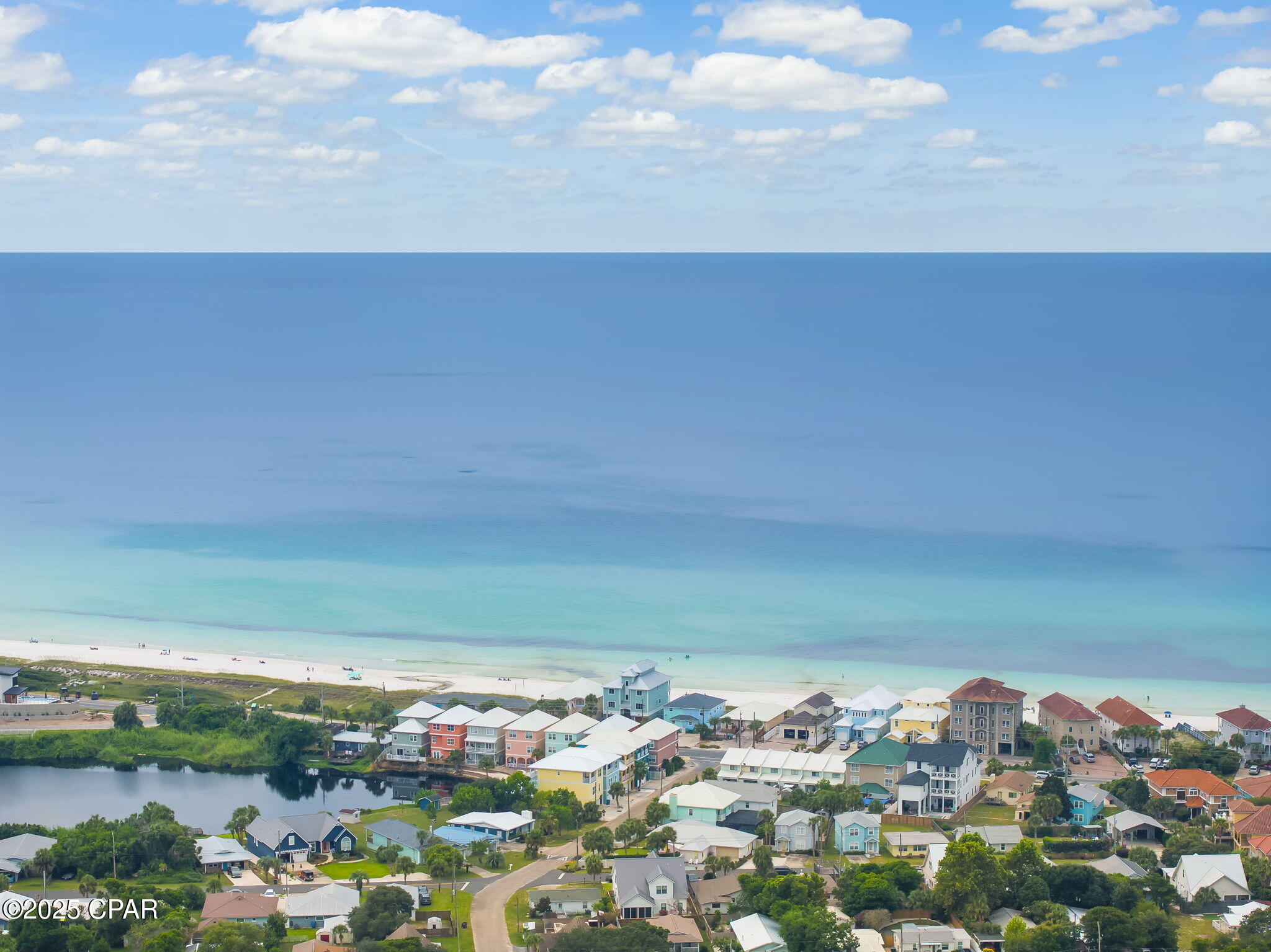 Coastal Living Starts Here! Build your dream just minutes from the beach. Located in a sought-after beachside community, this pristine vacant lot offers the ideal setting for your future home, vacation retreat, or investment property. With no HOA and a peaceful, well-established atmosphere, it's the kind of opportunity that rarely comes along - and never lasts long. The beach is just minutes away, easily accessible by golf cart, bike, or car. Whether you're heading out for a morning walk along the shoreline or catching a sunset over the Gulf, the coastal lifestyle is always within reach. Beyond the beach, you'll enjoy convenient access to local parks, boat launches, shopping, dining, and educational resources. From charming cafés to vibrant community events, everything that makes Panama City Beach special is right around the corner. Utilities are nearby, the street is paved, and the area is experiencing steady growth - making this a smart move for buyers with vision. Whether you're ready to build now or planning for the future, this lot delivers on location, lifestyle, and long-term potential. Opportunities like this don't wait. Secure your place in one of Florida's most iconic coastal communities and start building the life you've imagined.