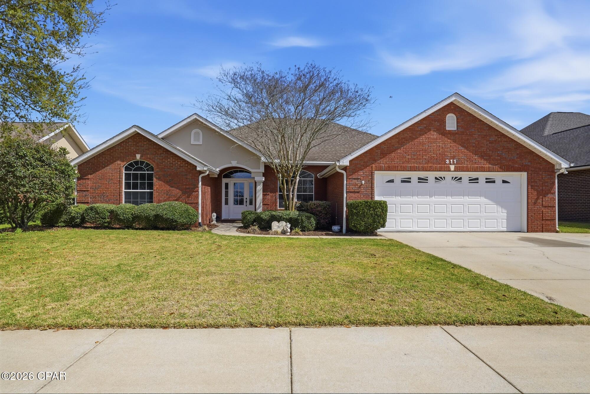 Welcome to this beautifully designed 4-bedroom, 2.5-bath home located in the desirable Meadows & The Pointe neighborhood, offering 3,096 square feet of total living space. The main home features 2,445 square feet, with an additional 651-square-foot detached bonus space that provides endless possibilities and would be perfect for a workshop, art studio, guest quarters, home gym, or recreational room.

Inside, the home showcases 10-foot ceilings, double crown molding, and upgraded light fixtures, creating a bright atmosphere throughout. The kitchen and bathrooms feature quartz countertops with stainless steel appliances, a deep farm sink and a convenient butler's pantry with power in the kitchen.

The home is finished with durable CoreTech luxury vinyl plank flooring, offering both style and easy maintenance. The thoughtful floor plan provides privacy and quiet living, as no bedrooms share a wall.

Additional features include an oversized two-car garage, a screened-in porch perfect for relaxing outdoors, and the roof replaced in December 2018 with gutters added as well as LeafFilter gutter guards.

Ideally located within walking distance to Nature Walk Golf Course, this home offers the perfect balance of comfort, space, and peaceful surroundings.