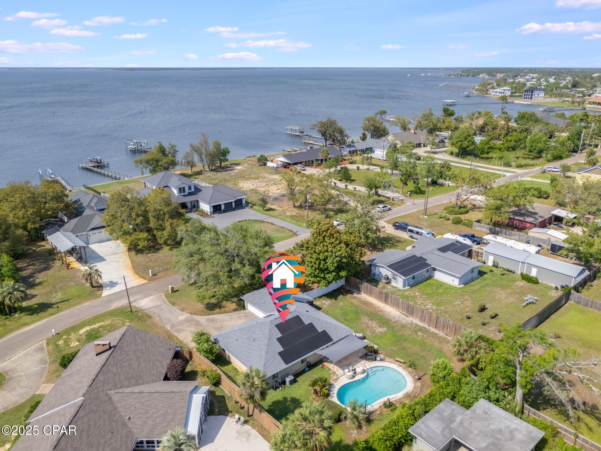 Bay views, a private pool, and an extra lot for outdoor living. This 3-bedroom, 2.5-bath home sits in a low-traffic neighborhood near the bay, walking distance to Carl Gray Park and the boat launch. Inside: LVP flooring, granite countertops, new light fixtures, and a open dining & living space perfect for hosting. Outside: a fully fenced backyard, in-ground pool with a new pump and filter, new irrigation system covering both front and back yards, and plenty of space for entertaining. 
Monthly rent includes partial electricity with solar panels and weekly professional pool service. *Pets allowed with prior approval*