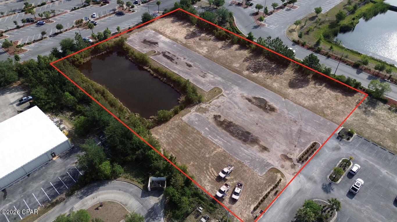 This developable commercial acreage offers visibility and access with deeded frontage to FL Highway 77, which sees approximately 30,000 vehicles per day. Strategically positioned adjacent to a Walmart-anchored retail corridor, the property benefits from strong existing traffic
drivers and established consumer patterns. Zoned for Mixed Use, this site offers flexibility for retail, office, service, or residential integrated projects.