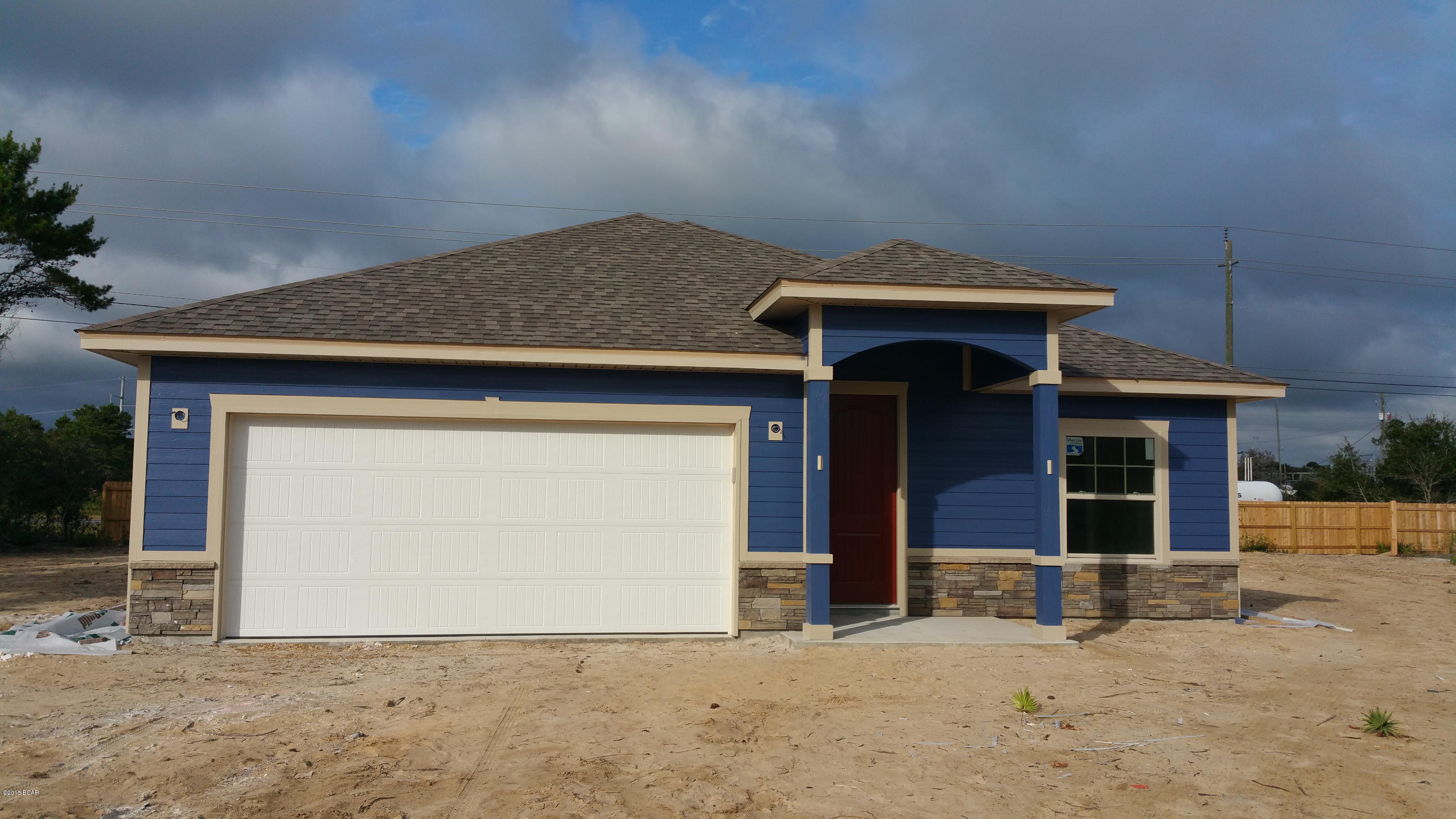 New Construction...West End of Panama City Beach. This beautiful 4 Bedroom, 2.5 Bath New Construction Home features 9/10 Foot Ceilings, 20 inch Porcelain Tile Flooring throughout Main Living Area and Bathrooms. The Kitchen has Custom All Wood Cabinets with Soft-Close Doors and Drawers, Granite Counter Tops with under Mount Sinks, Breakfast Island and Whirlpool Stainless Appliances. Some of the Standard Features include: Tremendous Master Walk-In ''Step Down'' Shower with 2 Shower Heads, 8ft Interior Doors, Crown Molding, Paver Driveways, Upgraded Carpet and Pad, 14 SEER Heat Pumps, Anderson LOW E Double Paned Windows, Radiant Barrier Roof Decking (Reflects Heat Away), and Underground Utilities. Put this wonderful New Home at the Top of your List of Places to See.