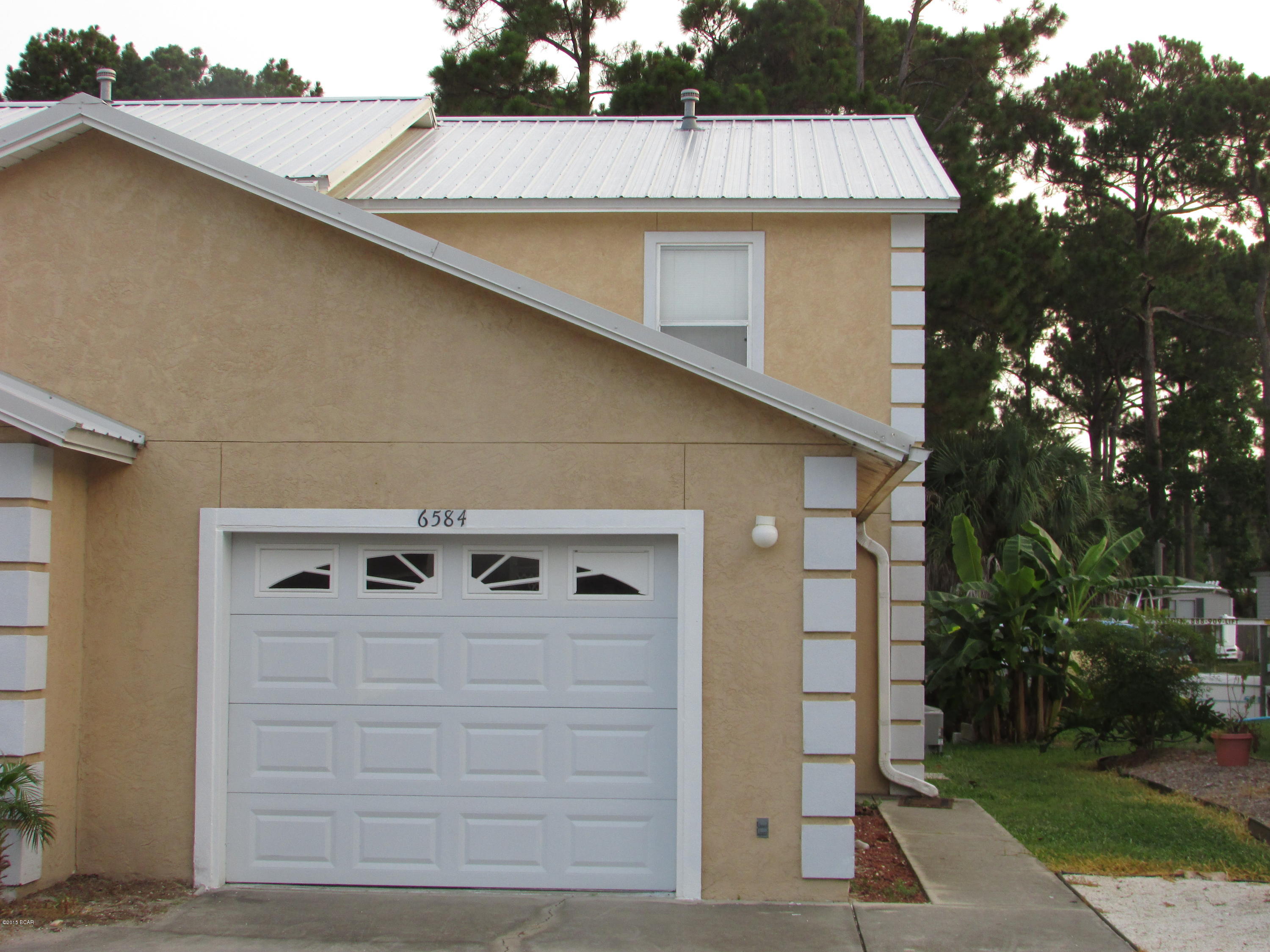 Canalfront town home located in gated Harbour Town community features 2 bedrooms, 2.5 baths with 1 car garage. Bedrooms are located upstairs. Community features tennis and in ground swimming pools. Lawn, basic cable and garbage included in rent. Stove, heat and water heater are gas. NO PETS