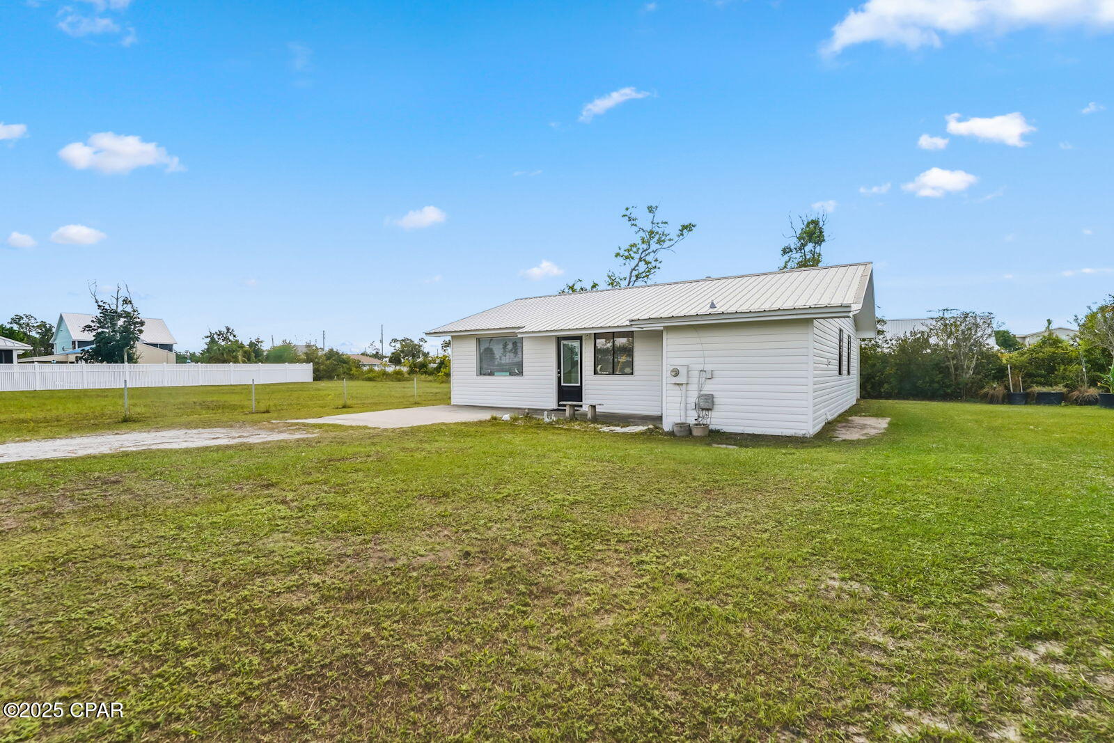 Charming Coastal Getaway Near the Gulf!

This home has had some major improvements. Enjoy peace of mind with a new metal roof (2022) and new A/C and furnace (2022) for year-round comfort. In 2025, the exterior received a fresh new look with new siding and new glass panes in all windows, enhancing both curb appeal and energy efficiency. A new fiberglass front door adds a stylish, welcoming touch that completes the home's refreshed appearance.

Nestled in a golf cart friendly community just minutes from the Gulf of Mexico, this adorable home offers the perfect blend of comfort, convenience, and coastal charm. Whether you're searching for a second home or an ideal vacation rental, this property checks every box.
Enjoy easy access to all that Mexico Beach has to offer, local shops, dining, and pristine white sands, while being perfectly situated near Port St. Joe for even more coastal adventures. With its inviting layout and low-maintenance design, this home is made for relaxed beach living.

Spend your days soaking up the sun, exploring nearby attractions, and cruising to the beach on your golf cart. This is the beach lifestyle you've been dreaming of, ready for you to make it your own!