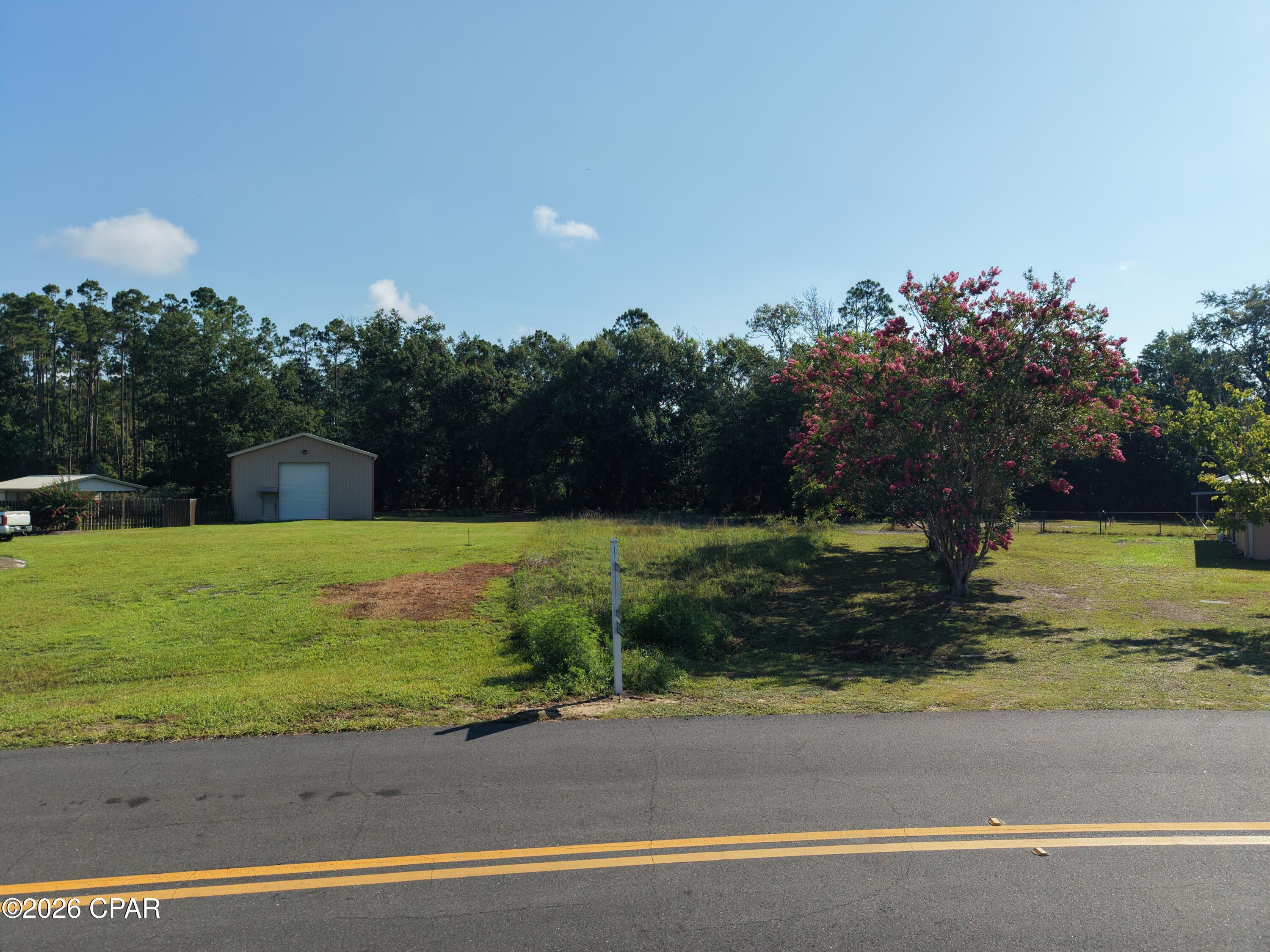 BUILD YOUR PARADISE! Discover the perfect setting to build your dream home on this spacious homesite. Offering over 1/3 of an acre, this oversized property provides plenty of room to create the coastal retreat you've always envisioned, with space for a custom home, outdoor entertaining areas, lush landscaping, or even a pool. Tucked away in a quiet neighborhood yet just minutes from the heart of historic Downtown Port St. Joe, you'll enjoy the ideal combination of privacy, convenience & small-town coastal charm. Living here means embracing the laid-back lifestyle that makes Port St. Joe one of Florida's most desirable waterfront communities. Hop on your golf cart & cruise to the vibrant downtown district filled with locally owned restaurants, boutique shopping, coffee shops, parks, the marina & year-round community events. Conveniently located near the Port City Trail, you'll enjoy miles of scenic paved paths perfect for walking, biking, jogging & golf cart rides while connecting you to downtown, waterfront parks & many of the area's favorite destinations. Spend your days fishing, boating, kayaking, paddleboarding or scalloping in the crystal-clear waters of beautiful St. Joseph Bay, then head to the nearby sugar-white beaches of Cape San Blas, St. Joe Beach & Mexico Beach for unforgettable sunsets & endless outdoor adventures. Whether you're planning your forever home, a seasonal getaway or an investment property, this generously sized parcel offers outstanding potential in a location that continues to grow in popularity. Large in-town homesites like this are becoming increasingly difficult to find, making this an exceptional opportunity to secure your place in one of the Gulf Coast's most welcoming golf cart-friendly communities. Don't miss your chance to build the lifestyle you've been dreaming about. Call for your private tour & LIVE THE BEACH LIFE!