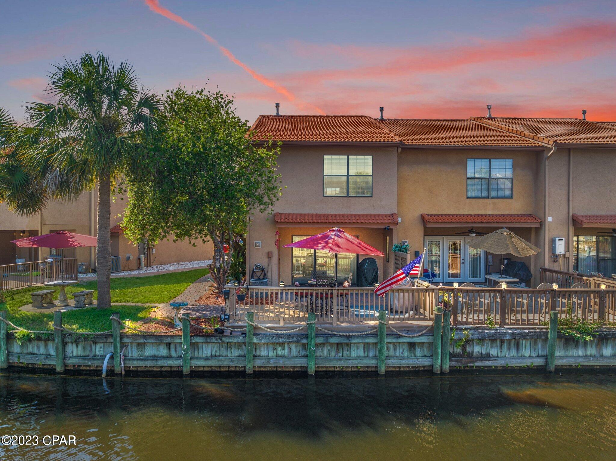 Wonderful opportunity to own this Extra-Large, Fully Furnished, Fully Updated, Rental Ready End Unit on the Canal. STR allowed with projected ROI of 60k+! This beautiful townhome is located on the island, only a 3 min short walk to the beach in the desired Gulf Highlands Beach Resort! As you enter this home you will appreciate the quality updates like: new granite countertops, SS appliances, fully remodeled baths with tiled walk-in shower, new vanities, shiplap, LVP flooring and stairs etc. Brand new HVAC unit installed 3 months ago. You will love the privacy and the canal views from the deck or the Cute sitting area on the right where you can enjoy the evenings and Florida nature. The biggest community pool(11 total) in front of the unit. This is the ONE! All the info is believed to be correct but all parties must do their due diligence.