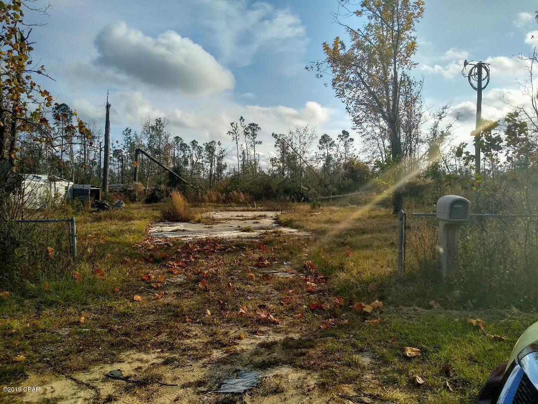 This is a very large fenced lot just off of 2301.  Approximately 17 miles from town going up 231 or across 388.  Very convenient to the airport.  There are 2  buildings are on the land only 1 conveys..  Blank slate ready for your new home.  Oversize septic system built to support 2 homes, well and fencing is already in place.  Very quiet neighborhood..