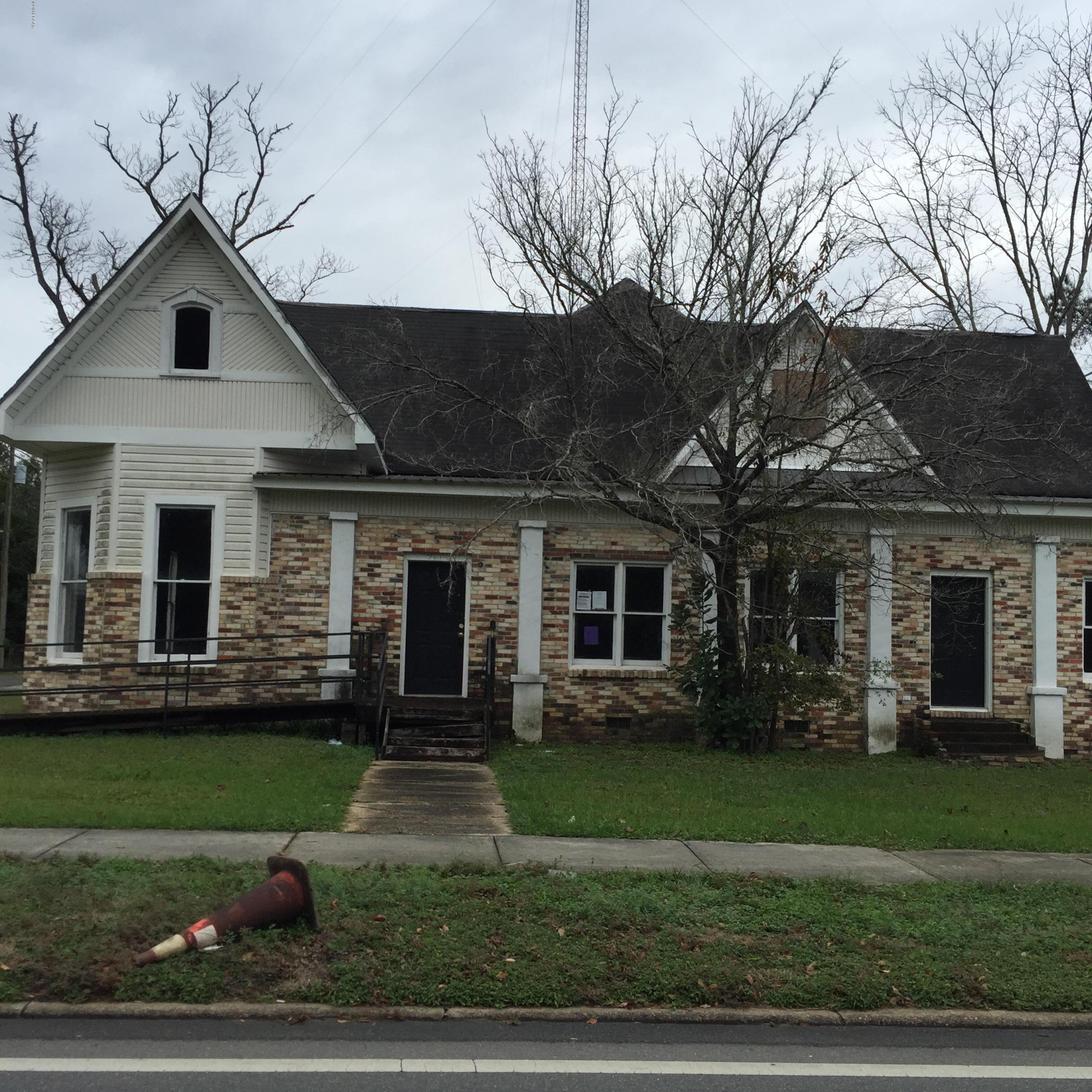 COMMERCIAL Property with 4294 Sq ft located on a corner Lot!  Home needs extensive work but Located on 2.74 Acres this property can make the perfect location or your business!!!! Home will be sold on the auction. This property is now under absolute auction terms. Auction dates are March 29-April 2