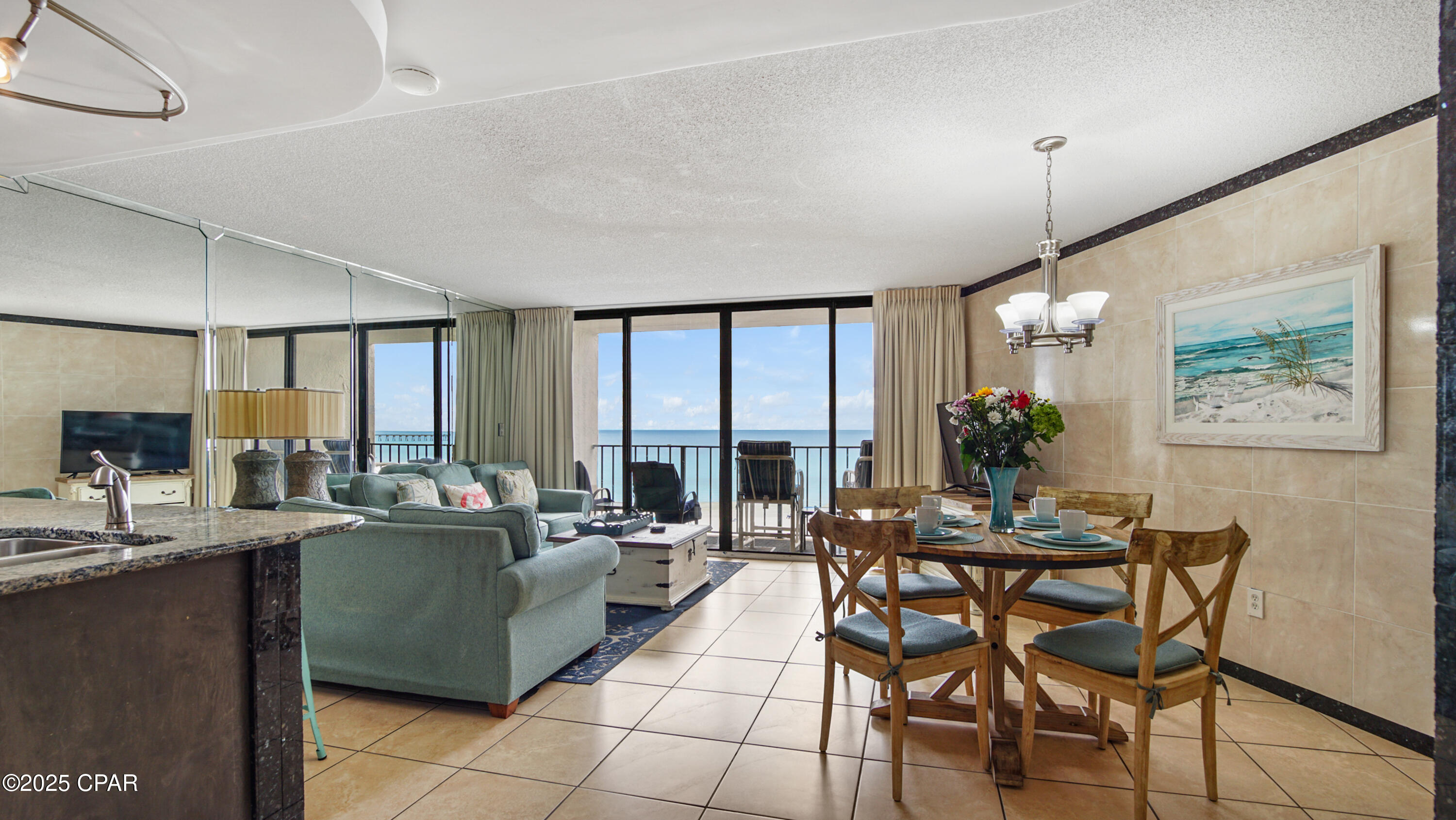 UPDATED!  LOW FLOOR!  COASTAL MEDITERRANEAN STYLE 2BR/2BA GULF FRONT CONDO WITH PRIVATE BALCONY & FABULOUS UNHINDERED VIEWS OF SUNSETS, PRISTINE WHITE SANDY BEACHES & EMERALD COASTLINE IN WELL SOUGHT AFTER EDGEWATER BEACH RESORT!  Updates: All tiled flooring & walls, kitchen craft wood cabinets, exotic marble countertops, stainless steel appliances, wet bar/wine bar, modern gray slat ceiling tiles, open kitchen with upscale lighting. Master bath renovated, bedroom updates with ''Calif Closet Style Built in Cabinets, custom window plantation shutters in bedrooms, and blackout curtains. Sold fully furnished & rental ready.  MOTIVATED SELLER!  Edgewater Beach Resort is a Gated Community boasting the best exclusive amenities in PCB.  11,800 sq. ft. lagoon -pool with waterfalls & tropical landscaping, 9 heated pools(seasonal), 4 hot tubs, Peak Season Poolside activities/live music, Pizza Shack, Ocean's full service restaurant & bar, Edgie's/Starbucks Coffee Shop/Ice Cream Parlor, Spa, Fitness Center, Pro Shop, Executive 9 hole Golf Course, Pickleball, & 11 lighted Tennis/Basketball courts. Free Access to Sports Courts and Fitness Center. Equipment Rental and 9 Hole Golf Course are additional cost.  24 hour onsite security.  Close to fine dining, grocery store, Walmart & just a short drive to Pier Park Shopping, Entertainment & Restaurants.  Easy access to the airport.