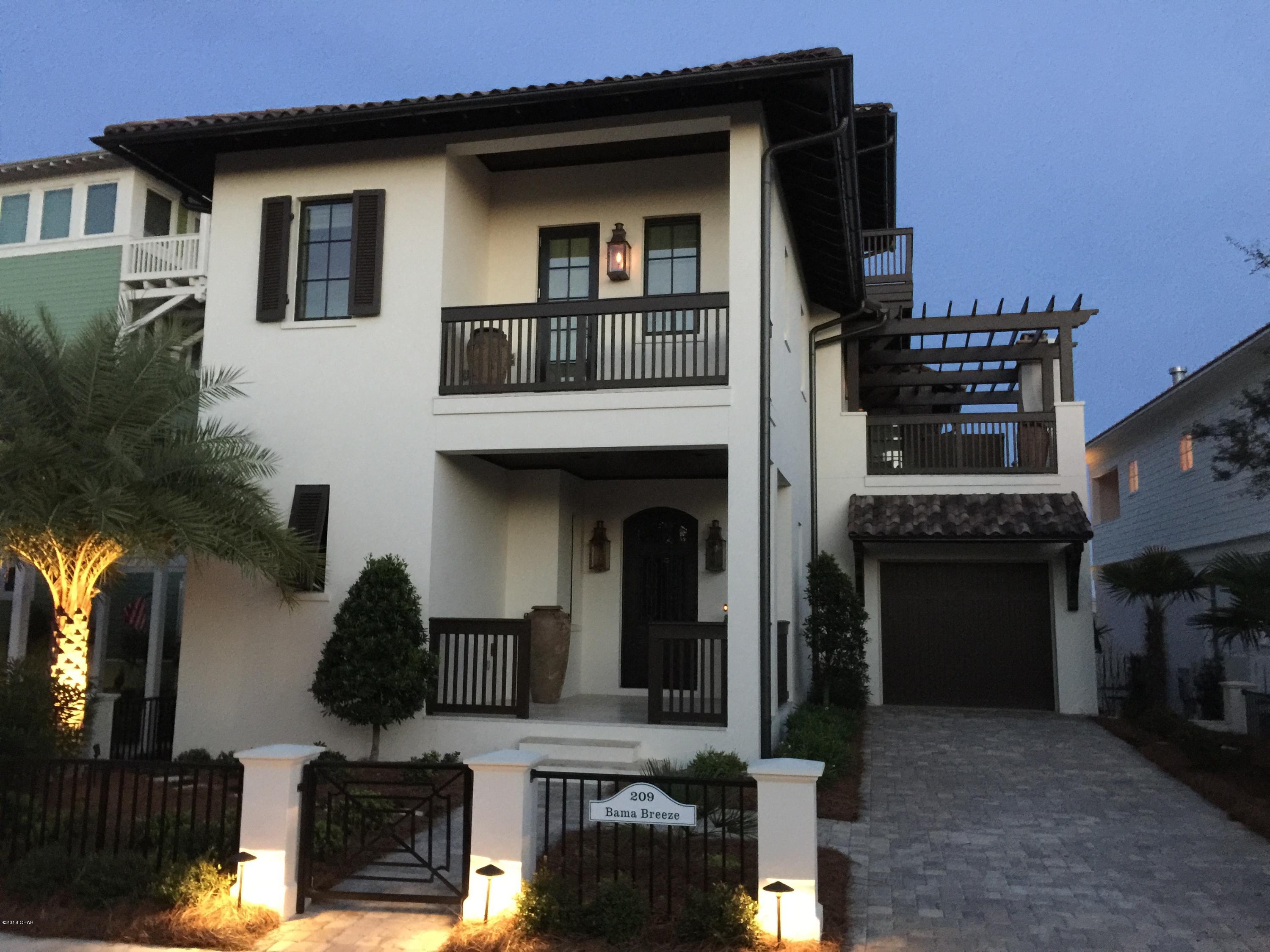 Custom built home in the Premier ''JEWEL BOX'' community of Carillon Beach. This home is a DECORATORS DREAM HOUSE. Most furnishing inside convey with a list of items that do not.  Wood flooring and Travertine. Quartzite  & Granite counter tops.  Has cypress beamed ceilings, designer cabinets, designer faucets and light fixtures you only dream about. Sitting area in Master with a wet bar and built in entertainment centers EVERYWHERE! The Master Bath has a CAST IRON Claw Tub with Separate Shower. Balcony off the Master Bedroom offers serene lake views. Fireplace Balcony off the 2nd floor. Courtyard by the kitchen that is contained. Outside kitchen & Shower.Elevator 4'X5' 

To many CUSTOM features to even mention.

This home is all BLOCK construction with CLAY ROOF. 

No finer home in the are This home has a gas fireplace inside and an exterior wood burning fireplace with gas starter. The 3rd floor bonus room is perfect for office, sitting area or extra sleeping area for guests. This gorgeous home is nestled in the quaint community of Carillon Beach, you truly get the feeling of stepping into a magic hidden gem.  This gated community offers 24 hour security with roving security. It has 2 tennis courts, 3 pools (1 heated in winter) and children's playground as well as a basketball court. A meeting house that serves as a church on Sunday and a downtown with a full GYM, stores, and restaurants.  Publix,  Winn Dixie, CVS  and other stores and restaurants are within easy walking distance.
