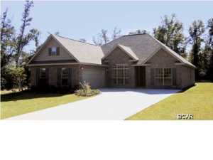 The Davenport has an elegant exterior with an interior that was created for entertaining! This all 3/2.5 home has a grand entry accentuated by hardwood flooring and a bonus room over the garage. The Davenport contains distinguished arches and formal dining and living/study on either side of the foyer. The kitchen is very generously sized and has a long breakfast bar that opens to the family room. The kitchen includes: stainless steel appliances, 3 cm granite, designer cabinets and large island. This combined living and kitchen, with its exclusive design and space is an entertainer's dream. The master suite is very large and has a luxurious bathroom which includes a garden tub, separate tiled shower, double vanity, water closet and huge walk in closet. The laundry room has its