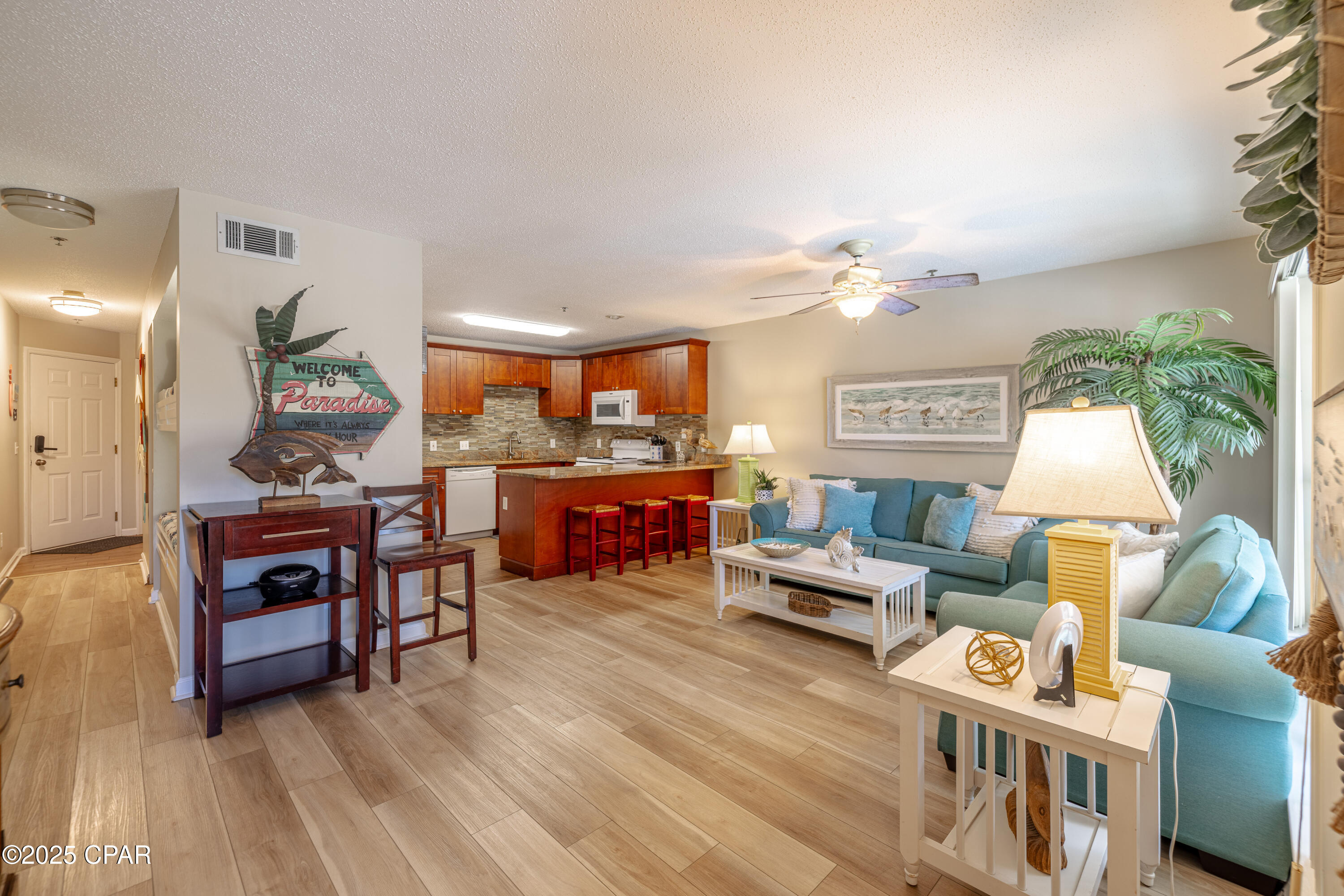 Great Value in Horizon South! This well-priced unit is ideally located just off Front Beach Road and only a short walk to the beach. Enjoy the convenience of being just minutes from 30A, Pier Park, shopping, dining, and entertainment. Horizon South offers outstanding resort-style amenities, including multiple pools, hot tubs, tennis and pickleball courts, mini golf, a fitness center, and a gated, golf cart-friendly community. Whether you're looking for a vacation getaway, investment property, or full-time residence, this location offers exceptional value and convenience Sleeps 6. This spacious updated unit features a large  kitchen with beautiful granite and well equiped with cookware and dishes.  Spacious living room, tastefully decorated.  Sleeper sofa for added bedding. Roomy primary bedroom. 1.5 baths. Built-in bunk beds in the hallway. Beautiful LVP flooring. Enjoy your morning coffee or watch kids swim on the nice balcony that overlooks pool. . Being sold As-Is and totaly furnished including washer and dryer.
Call today for a personal tour!!