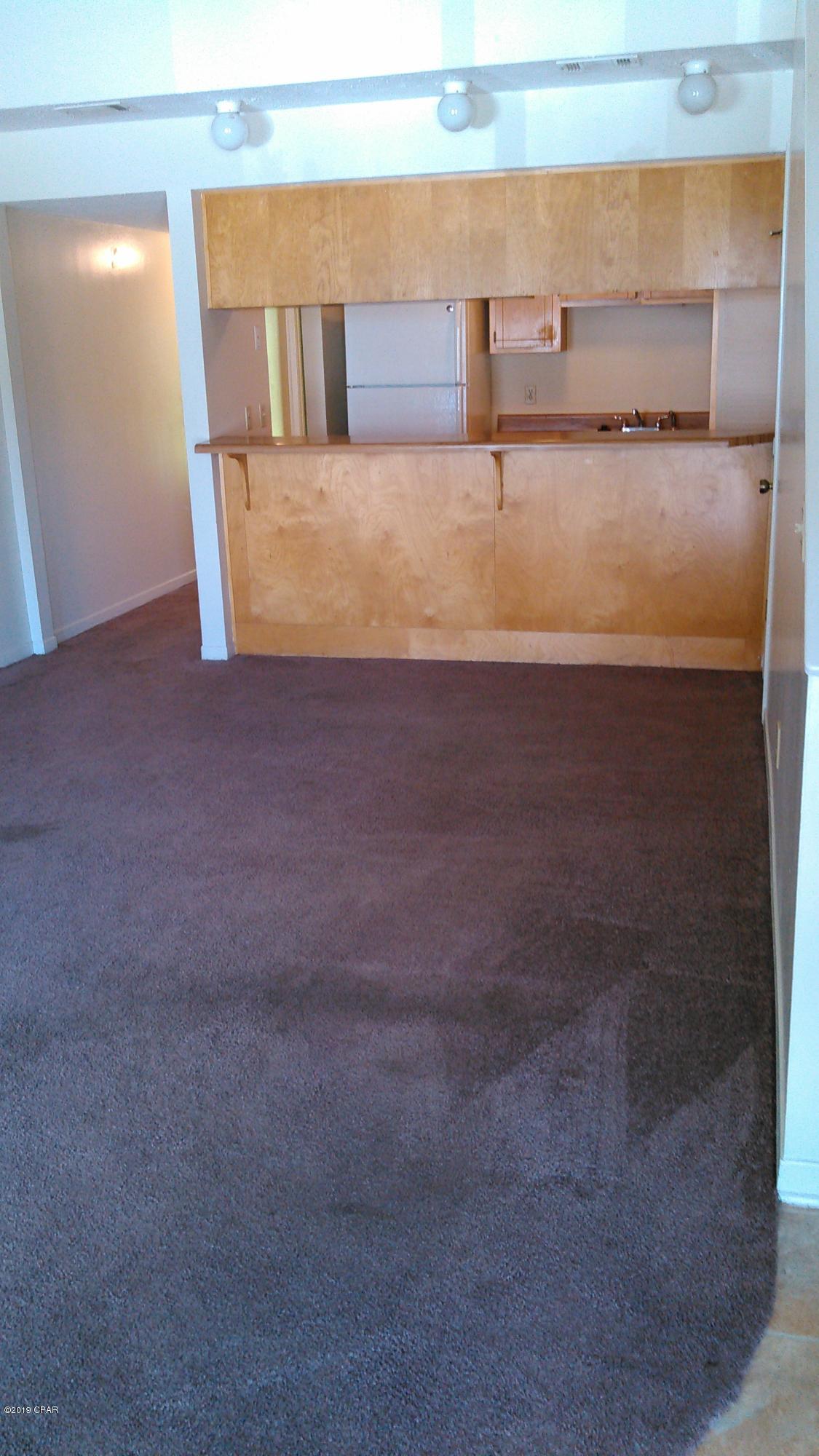Centrally located in St. Andrews, close to 23rd and 15th Streets shopping & activities.  2 Bdrm town home with bedroom and bath on 1st floor, separate bedroom and bath on 2nd floor.  Covered patio and outside locked storage.  No hurricane damage except roof - (new roof this year), and privacy fence (not yet repaired). ***NO PETS*** Non-negotiable.  $80.00 application fee.