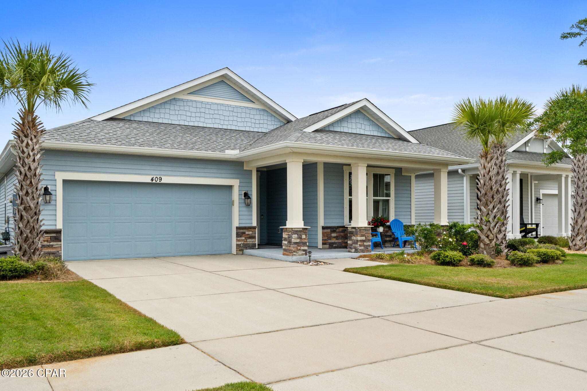 Welcome to Breakfast Point! 

 Step into luxury at 409 Warren Bayou Lane. This beautifully maintained home nestled in this quaint sought-after neighborhood provides quiet carefree living.  This 3 Bedroom and 2 bathroom home boasts a split-bedroom floor plan that offers privacy, with a large owner's suite showcasing expansive windows that flood the space with natural light, and tray ceilings. The on-suite bath is beautifully appointed with a huge walk-in-shower, and a dual sink vanity topped with granite countertops.   

The heart of the home includes an open great room, dining area, and kitchen island with stainless steel appliances, granite countertops, and a tile backsplash. Carefree living continues with the large family room that was made for entertaining. 
Natural light flows throughout this spacious Family room with large windows that look out to the enclosed Lanai.  
Outdoor living is enhanced with a large front porch and covered patio, to suit your entertaining or relaxing needs. A 2-car garage completes this functional and welcoming home.
One of Panama City Beach's most desirable communities that is conveniently located within walking distance to great schools, incredible shopping and just minutes from having your feet in the sugar-white sand beach. 
 
This opportunity you won't want to miss--schedule your showing today and experience refined Florida living at its finest and ''Live the Dream''.