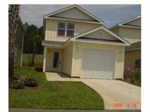 Gated Community located near Navy Base, shopping and restaurants. Two bedroom 1.5 bath townhome with 1 car garage is located at the Gates of Sterling Cove. Covered patio and outside storage area. Downstairs kitchen with breakfast bar, open dining room living room and 1/2 bath downstairs. Bedrooms on second floor with full bath and laundry area with stack washer and dryer. Both bedrooms have French doors leading to balcony area. These townhomes are adjoined by the storage room walls and do not share a wall with neighboring units.