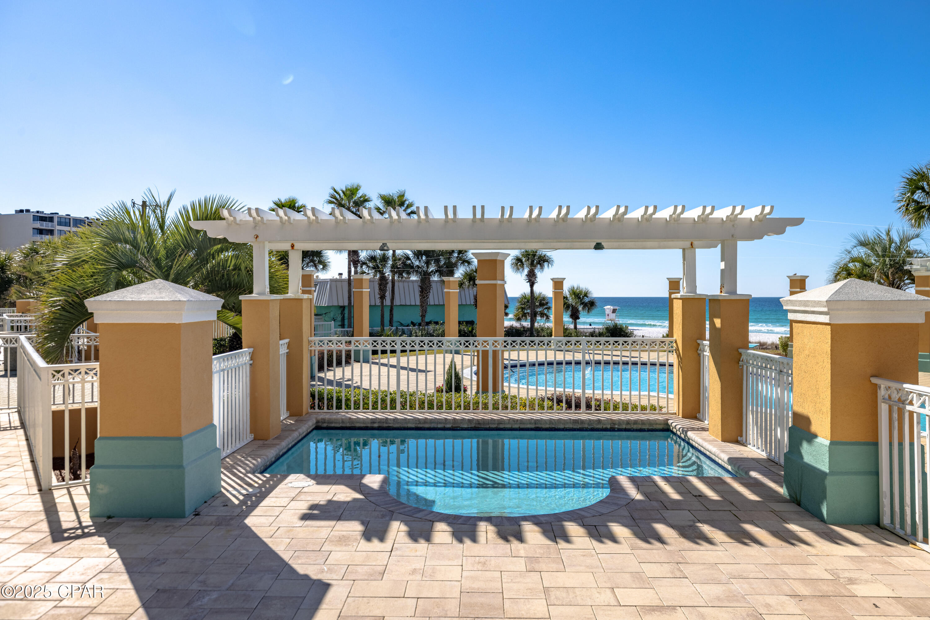 Ground floor 4 bedroom penthouse. There are only 2 units on Ground Floor. En Soleil enjoys 450 feet of pristine Gulf frontage. This private and secluded Penthouse is located in the east building with awesome panoramic views! This unit features 4 bedrooms 4 baths, crown molding, granite counters tops, stainless steal appliances, beautiful cabinetry, spacious breakfast bar, fireplace, large foyer entry, 8'doors, office room, a huge over sized covered patio with private pool, built in gas grill with granite bar area. En Soleil is one of the only developments to offer private under building parking. The amenities at En Soleil are top notch in luxury with an expansive lagoon pool, gulf front fitness center, tropical landscaping, hot tubs. LUXURY AND PRIVACY meet to create a