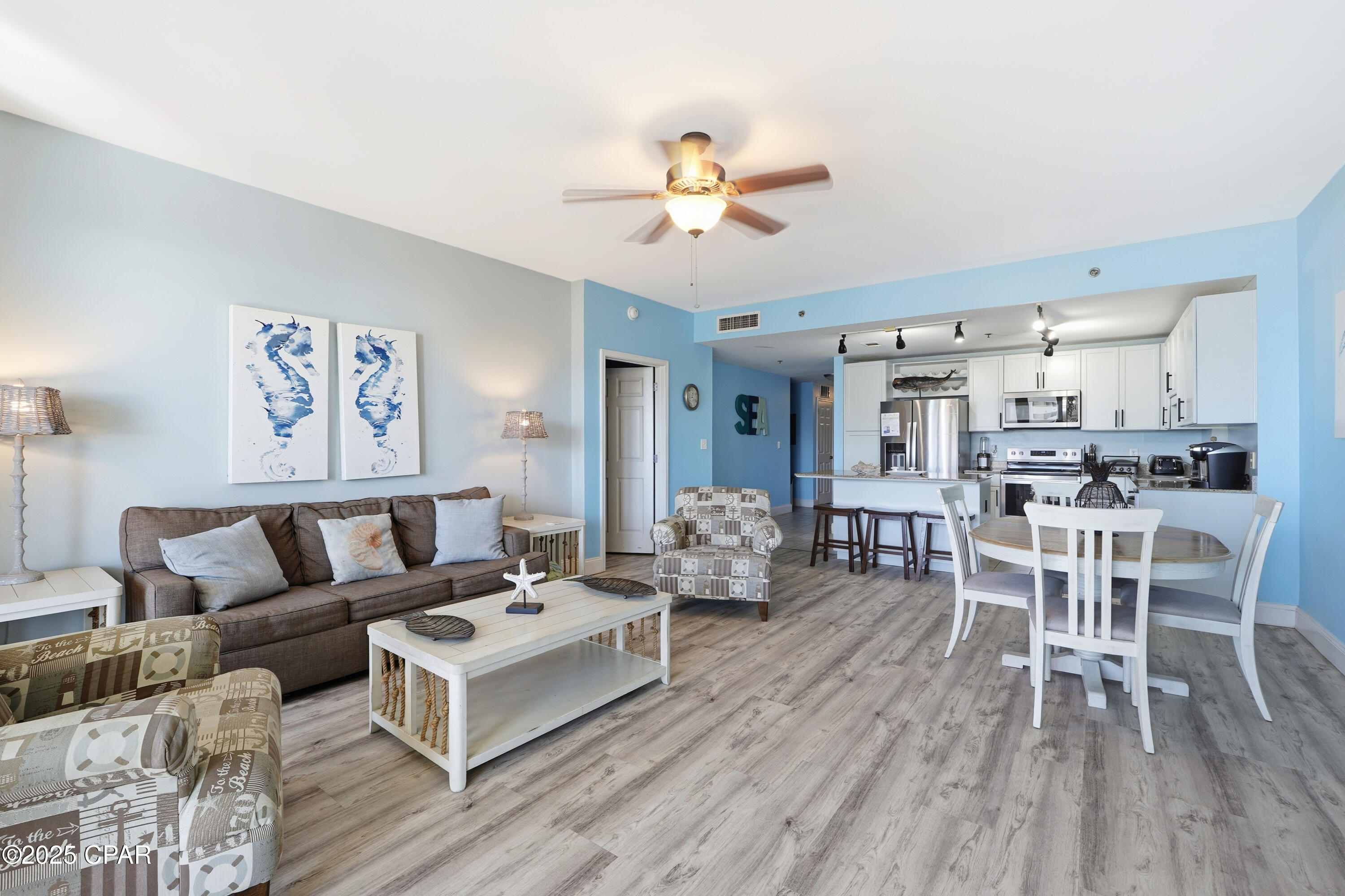 Beautiful 3 bed 3 bath condo with views of the Gulf from the main living space and main bedroom. 2 bedrooms are en suites and the 3rd bedroom shares with the bunk room! Sleeps 10 without being cramped for that beach time. Everyone has their space. This condo is ready for a new owner and new stories to create with familyand friends. No carpet, fresh paint throughout, fresh white cabinets with new hardware ready for new stories to be written there. Main bed walks right out on the large balcony the width of the unit and 8 ft deep for ample space to enjoy whether taking in the rays, or cheers at sunset. This unit is perfect for the whole family. Located in the sought-after Laketown Wharf Resort, this condo gives you access to a vibrant lineup of amenities. The resort features five pools, including a zero-entry pool, a heated pool, and a kid-friendly pool, along with two hot tubs and a fitness center overlooking the Gulf. A putting green and multiple onsite restaurants are just steps away, and the brand-new 810 Billiards & Bowling with axe throwing offers the perfect option for rainy-day fun. The private boardwalk is a favorite, offering stunning 360-degree views of the property and showcasing a nightly water fountain light show that never fails to impress. Whether you're seeking a personal beachfront escape or an investment-ready vacation rental, this property delivers an unbeatable blend of luxury, leisure, and location. Don't miss the chance to own this striking piece of paradise.