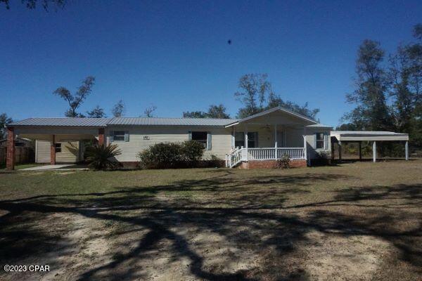 MULTIPLE OFFERS on property.  Highest and best due by 6/16 at 7 p.m.  Great opportunity to own in Southport Home features 3 bedrooms 2 baths, in established neighborhood, with large lot, and convenient to all amenities. Home has an attached carport and a detached pole barn, large shed that needs some work and another shed to tinker in. Inside you have a living room, family room with fireplace and open kitchen/dining room, master bath is open with a shower and tub along with double vanities.  Needs a little TLC but could be a good home for a family needing plenty of room for kids to play, the fur babies to roam, and a dad needing somewhere to park the boat and toys.  Call today to see this home. Sold AS-IS. *Information provided is deemed reliable but is not guaranteed and should be independently verified by the buyer*
