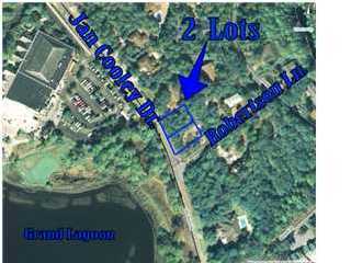 Great corner building lot across the street from the Lagoon. Enjoy the amenities of Bay Point without the HOA fees. Located in next to Bay Point on the quiet end of Panama City Beach. The adjacent lot is also available and listed for $159,900. Zoned R-1 which is single family homes. Setbacks, 20'' on the front, 10'' on the rear and 5'' on the sides.