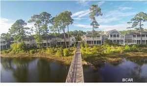 Great location and beautiful lot overlooking the pond in the gated community of Watersound West Beach. WaterSound West Beach is a quaint community of classic coastal homes nestled on the south side of Scenic Highway 30A and bordered by both the Gulf of Mexico and Deer Lake, one of South Walton's rare coastal dune lakes. Owners in this private community enjoy an array of premium amenities including a zero-entry swimming pool with grill area and outdoor fireplace, parks and green spaces, a puttering park, winding nature trails, access to the WaterSound Beach fitness center and private beach access.