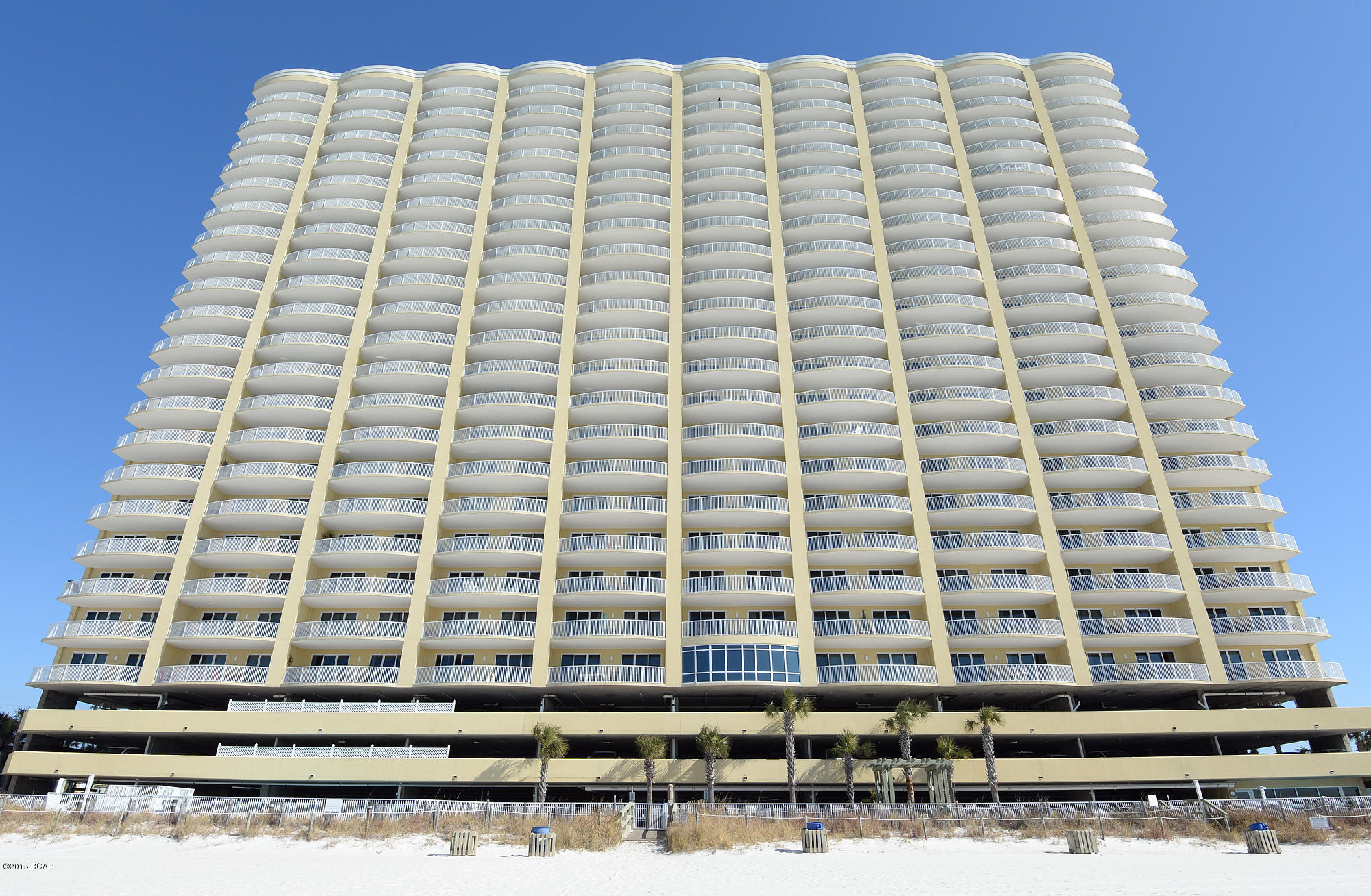 **PRIME-FLOOR AT EMERALD ISLE**  This beautiful 2BR/2BA condo at Emerald Isle in Panama City Beach is being offered fully furnished and ready to rent.  Gorgeous, brand new floors have been installed which makes this unit really warm and inviting and the hi-tech ''Nest'' thermostat will lets you control the HVAC system from anywhere, saving you money on utilities AND giving you ultimate control by letting you put limits on the temperature settings so renters don't abuse.   Emerald Isle remains one of the more popular projects on the west end with the ever popular, oversized, curved balconies...call today to schedule an appointment to view.