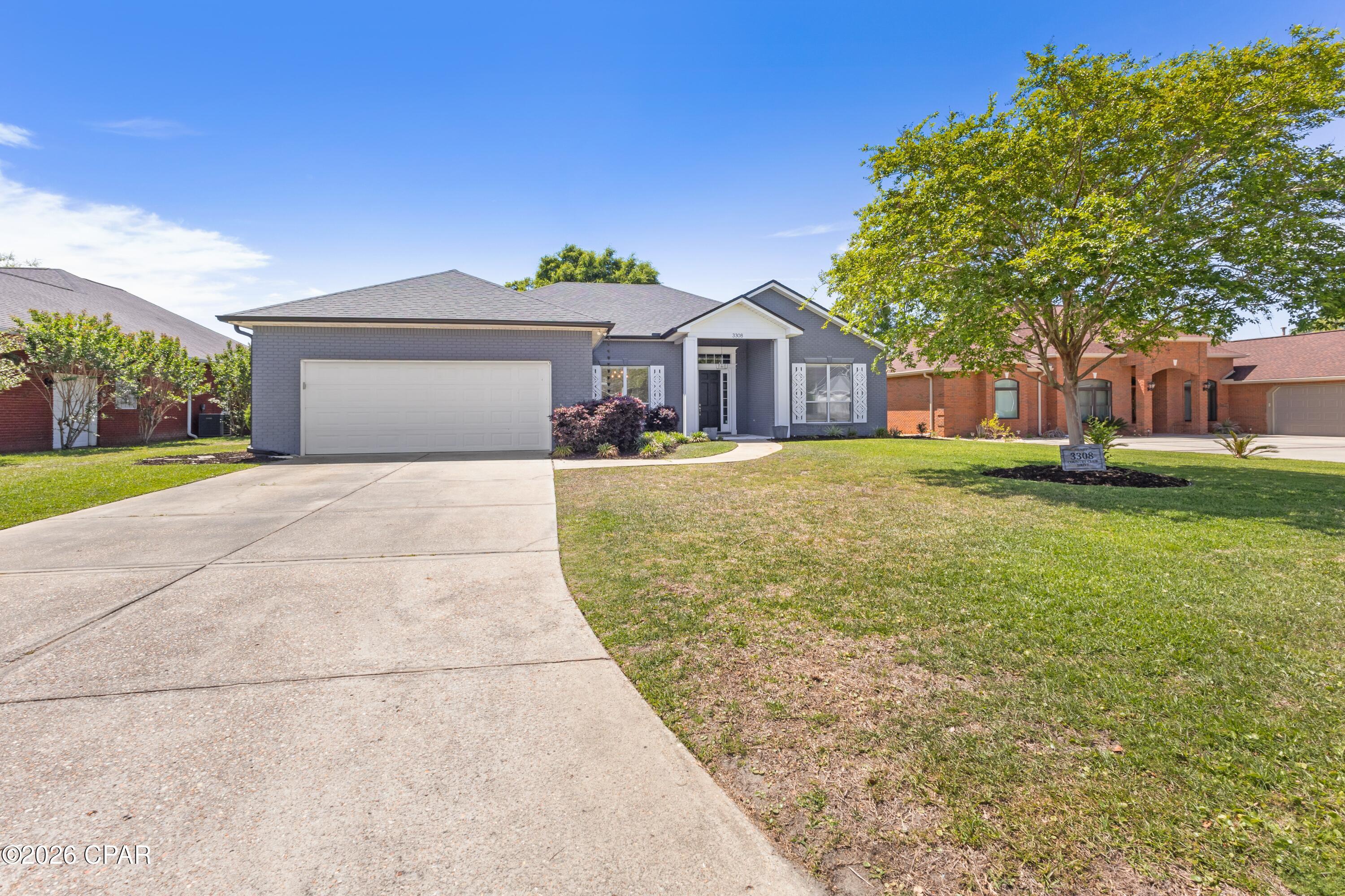 Welcome to an exceptional opportunity to own a beautifully maintained home in the highly desirable Panama Country Club golfing community. This 4 bedroom, 3 full bathroom residence offers a perfect blend of comfort, style, and modern upgrades ideal for families, retirees, or anyone seeking a relaxed golf course lifestyle. The open flow between the living, dining, and kitchen areas creates a welcoming atmosphere filled with natural light. The primary suite offers a private retreat with ample space, while additional bedrooms provide flexibility for guests, family, or a home office. Known for its scenic views, peaceful surroundings, and strong sense of community. The property's location provides convenient access to shopping, dining, schools, and nearby beaches. Upgrades include new roof in 2025, new kitchen counter tops, and new lightening fixtures. Call today for your private showing at one of our areas most sought after neighborhoods.