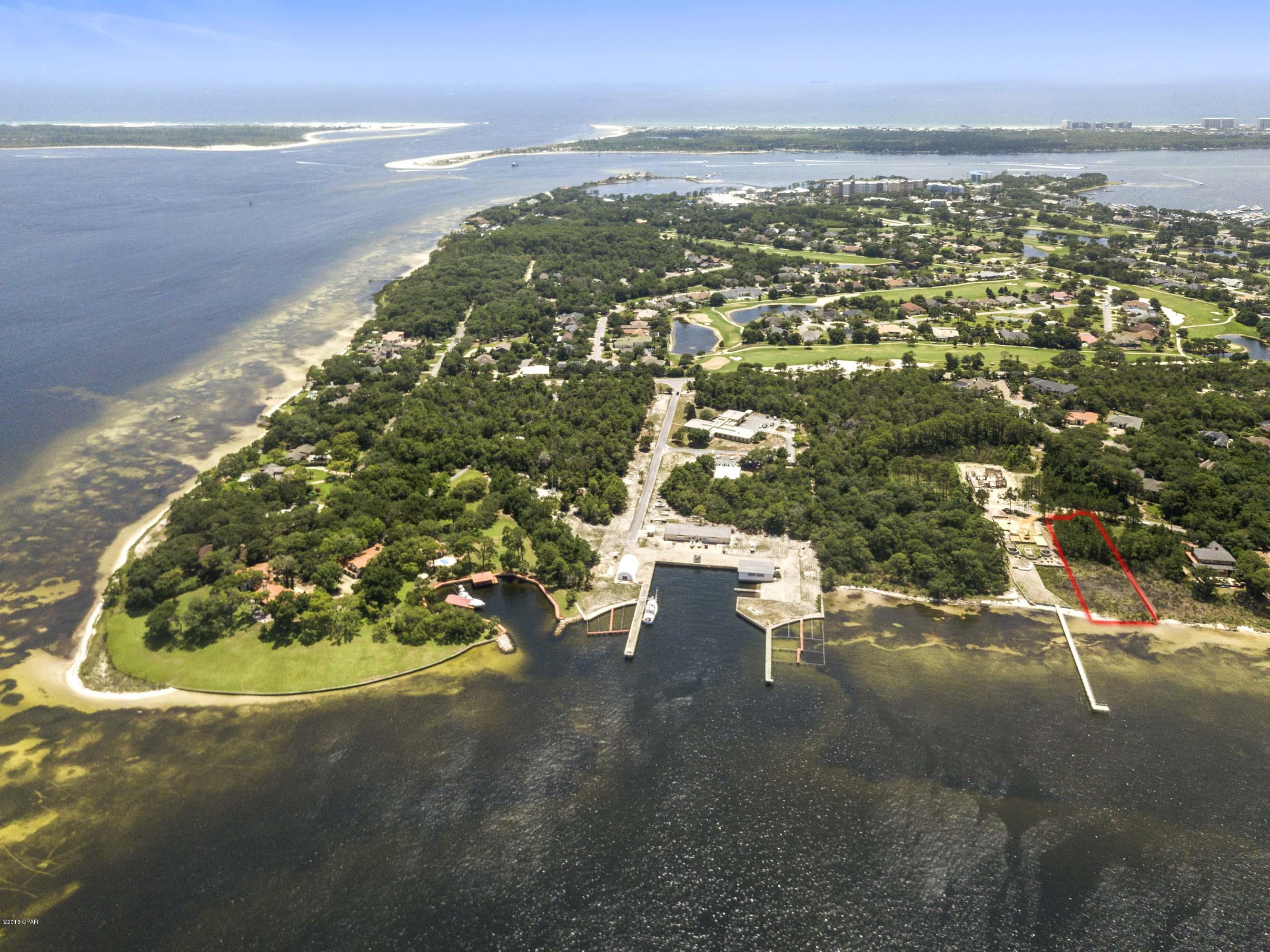 Incredible Bay Front Lot in the Preserve on the Bay. This lot is nearly an acre and offers an expansive private canvas to build a dream oasis. The property boasts astounding views and proximity to the Pass and Shell Island. There aren't many lots left that offer this type of opportunity and location anywhere in our area and The Preserve is one of our most desirable communities.