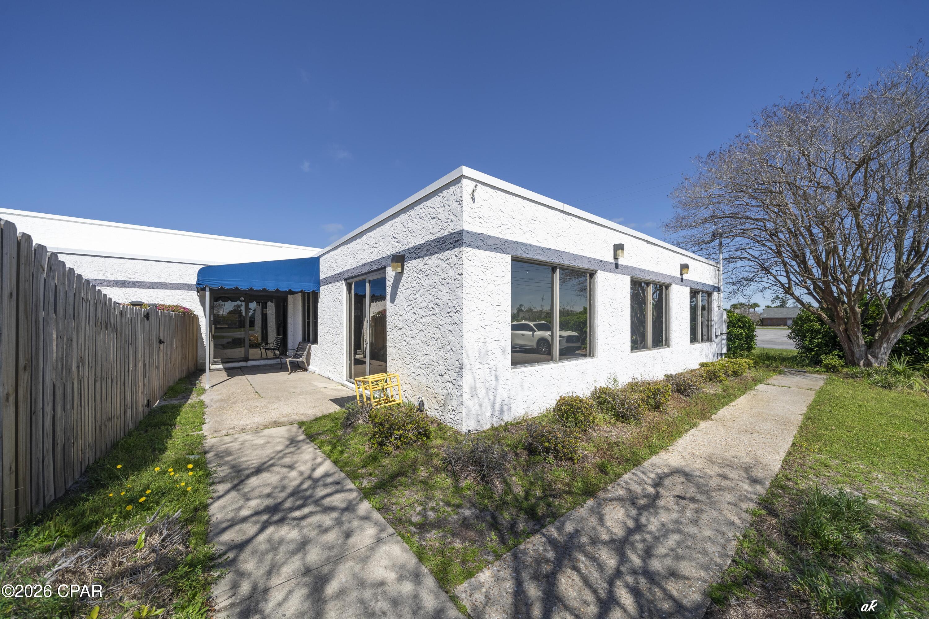 Positioned just off Tyndall Parkway, one of Panama City's highest-traffic corridors, this 5,000 square foot heated and cooled commercial facility offers outstanding visibility and accessibility in a rapidly growing area on the East side of town. Surrounded by established businesses, popular restaurants, and dense residential communities, this location provides consistent traffic and strong exposure for a variety of uses. The interior is thoughtfully laid out to support a variety of uses, featuring three large open activity areas, a front reception space, private office, retail or display area, and dedicated storage. Playground on site, school / church uses as well. The design allows for efficient flow and functionality, making it easy to adapt to different operational needs.
This property offers strong flexibility for multiple business types, including childcare, fitness or training facilities, or a retail/office conversion. With its open layout and existing infrastructure, the space can be tailored to fit a wide range of business models without significant reconfiguration. With immediate availability for occupancy, this is a rare opportunity to secure a move-in ready commercial space in a high-demand location with strong surrounding growth and daily traffic flow.