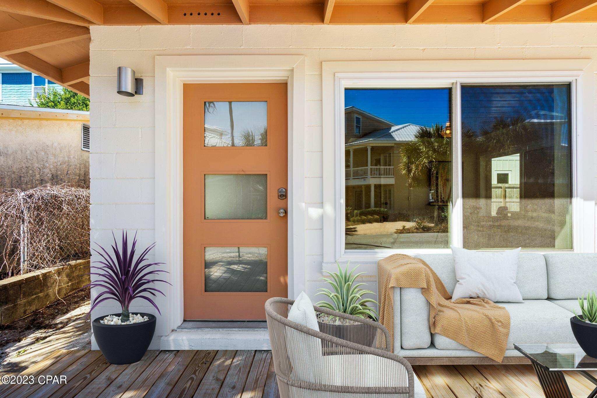 Nostalgic beach bungalow nestled in the heart of Sunnyside within 200' of beach access 89 on the west end of PCB. This prime real estate property offers the savvy investor the option of renting AS IS or add on to the existing foot print increasing ROI, or even a longer term plan of building a much larger home that can overlook the ocean. 

Renovations include a fresh yet modern flair and ready for the vacation rental season. One bedroom with one full bath features new hexagon terrazzo tile throughout, wood paneled ceiling, and retro and powder blue appliances and cabinetry, & tankless water heater.

New vinyl fence separates the yard from adequate parking.  Add paver stones and fire pit to complete this adorable cottage. Owner Financing options available. Contact agent for details.