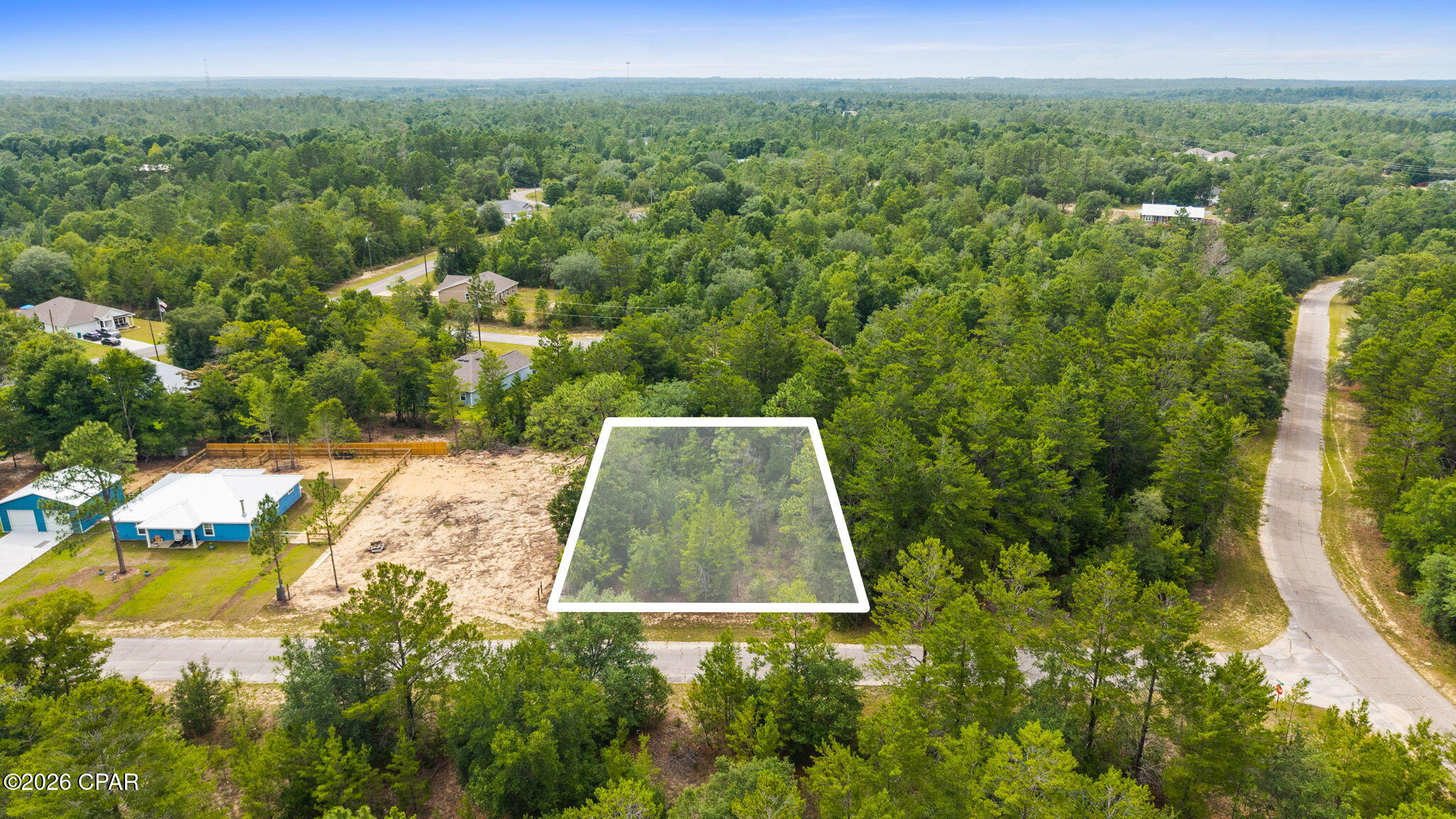 Come see this desirable lot in beautiful Sunny Hills that is perfect for your custom built home.  Sunny Hills is a growing community conveniently located between Panama City and Chipley. The amenities include an 18-hole golf course with Golf Club, many lakes and ponds for recreation, trails, parks, activity center, a library and more! Just around the corner is Boat Lake, which is locally famous for its white sandy beach and clear water for swimming, kayaking, paddle boarding, or fishing. Sunny Hills is a deed restricted community with no HOA fees, but subject to Sunny Hills deed restrictions. Taxes include a $40.72 annual assessment towards the Sunny Hills Municipal Benefits Services Unit that pays to enhance the community. There is another same size lot next door for sale if you are looking for a double lot.  Come see why this lovely community would be perfect for your new home today!