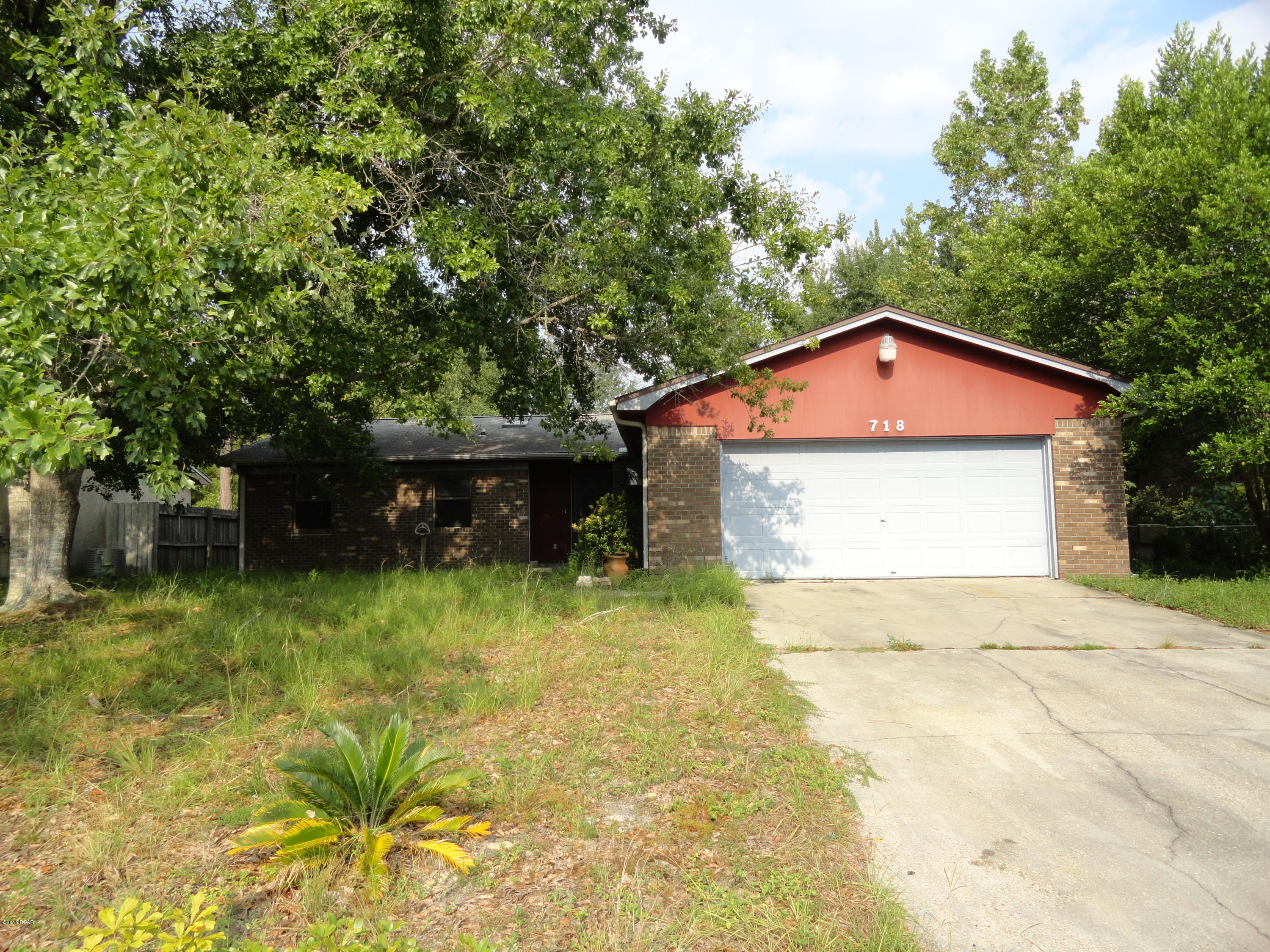 This 3 bedroom, 2 bath house is a wonderful opportunity for someone to get into a good home in a nice neighborhood. It is being sold AS IS and is in need of a complete new A/C system (cost estimate is $4,400). It would qualify for an escrow holdback at closing for repairs.  The roof is 16 years old, but looks great!  The many extras include 2 car garage, custom built in cabinetry in dining room, beautiful tile throughout great room and kitchen and carpet in bedrooms, fenced in yard and nice screened in porch to enjoy the evenings.  There is also a 12 x 6 yard building included in the sale.  Convenient to Tyndall AFB and Callaway WalMart this is a perfect location!  Renovation loan or escrow holdback necessary. This is a short sale and requires third party approval