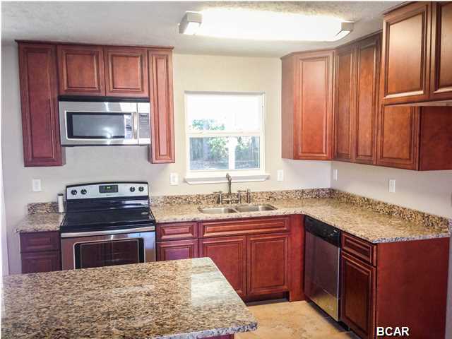 I am 6408 Lance, when my current owners found me I WAS in sad shape, luckily they are seasoned renovators that brought me back to life and truly MOVE IN READY....Can you believe I was only just built in 1996, I'm completely renovated and I have 4bd 2ba, a large back yard AND a garage all for such a GREAT PRICE!! Look at my roof with 30 year dimensional shingles. I have freshly paint walls and ceilings in every room. I have beautiful 20'' porcelain tile in the great room, hallway and bathrooms, and brand new carpet in the bedrooms. My Kitchen features new all wood cabinets, granite counter tops, an under mount sink, an island/breakfast bar, and of course new stainless steel appliances. My bathrooms feature new vanities, new toilets, new lights, new mirrors, new faucets and new