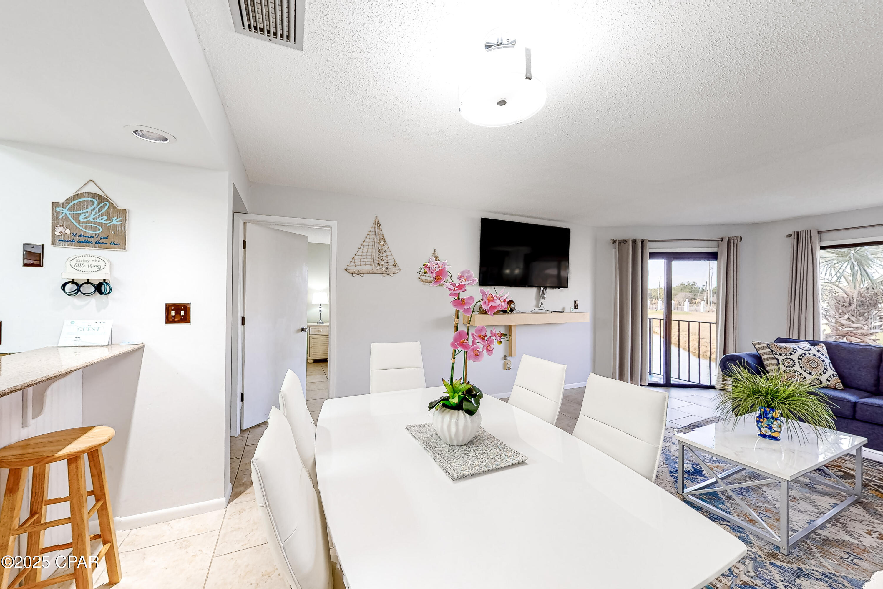Location, location, Highly desirable resort community. This spectacular end unit condo offers an all inclusive experience. Secure gated entrance with 24/7 security on site, Gulf front restaurant, multiple pools, golf course & turtle pond view. This spacious condo has been full renovated, with new shower, walking closet in the master bedroom, new furniture, granite counter top, raised ceilings in the kitchen, new appliances, title throughout the floor.  Perfect for a residence or income produce, this property delivers the best of PCB resort lifestyle.