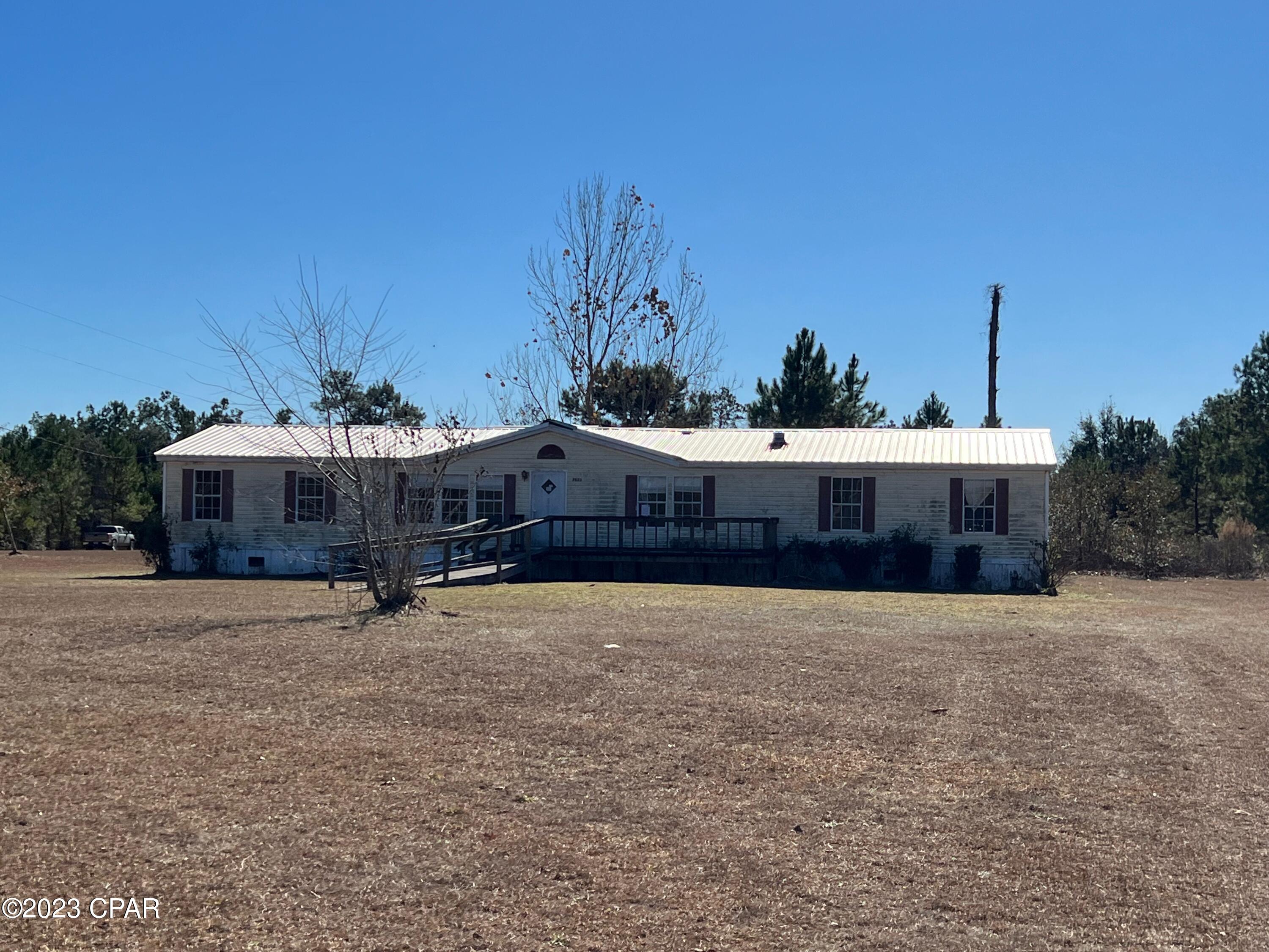 Need some space? Check out this 4 bd, 2 ba, 2128 sq ft home on 1.6 acres, and on a paved road.  Lots of room for the kids to play, family room with fireplace, office or sitting room in master bedroom area, and much more.  This home needs minimal updating, like maybe new flooring, appliances and replace some vinyl.   Call today for that private showing. Talk to your Lender/Mortgage Broker about the $100 DOWN PROGRAM AND FHA'S 203B LOAN THAT WILL ROLL THE COST TO COMPLETE REPAIRS INTO THE LOAN, UP TO $10,000.(All info is approximate and buyer to verify anything that is important.)