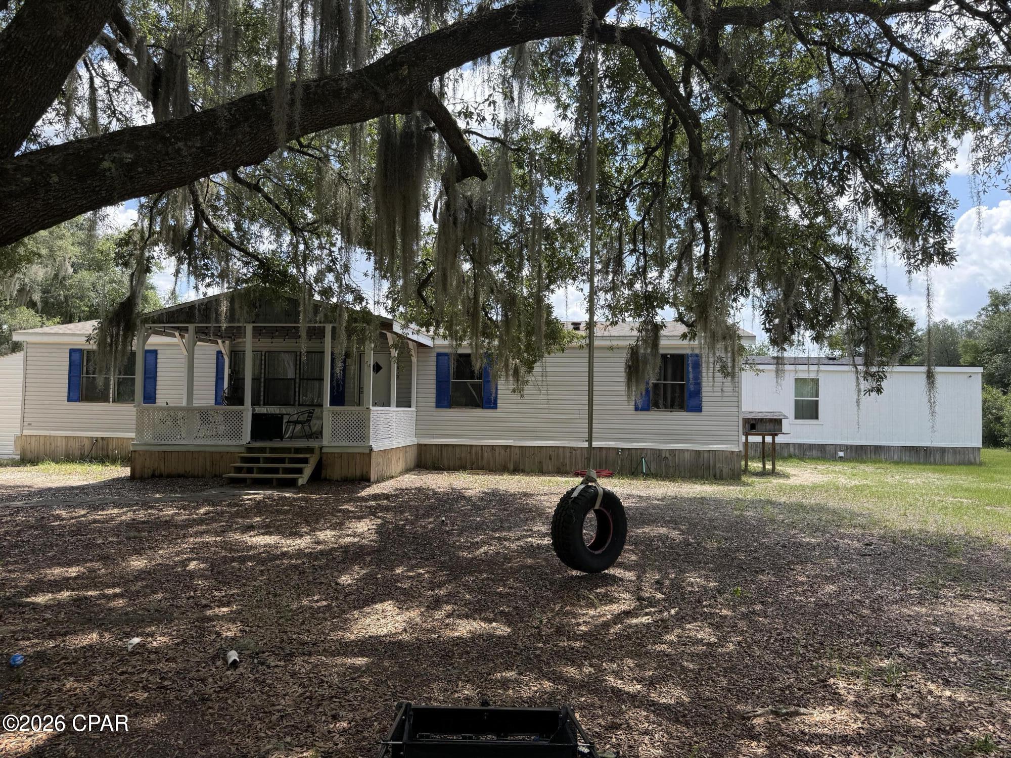 . This versatile property comprises three separate dwellings across 10 acres of wooded land in a pristine country setting.

Main residence: 3 bedrooms and 2 bathrooms, plus a flexible bonus room that can serve as a 4th bedroom.
Guest House A: 2 bedrooms and 1.5 bathrooms, with potential to add a kitchenette.
Guest House B: 1 bedroom and 1 bathroom, with potential to add a kitchenette.
Additional features include a utility shed equipped with electric, heating, and air conditioning. The expansive, wooded acreage offers privacy, recreation, and room to expand.
20 foot conex container on property for storage 

A must-see to fully appreciate the space, flexibility, and setting. Schedule your showing today.