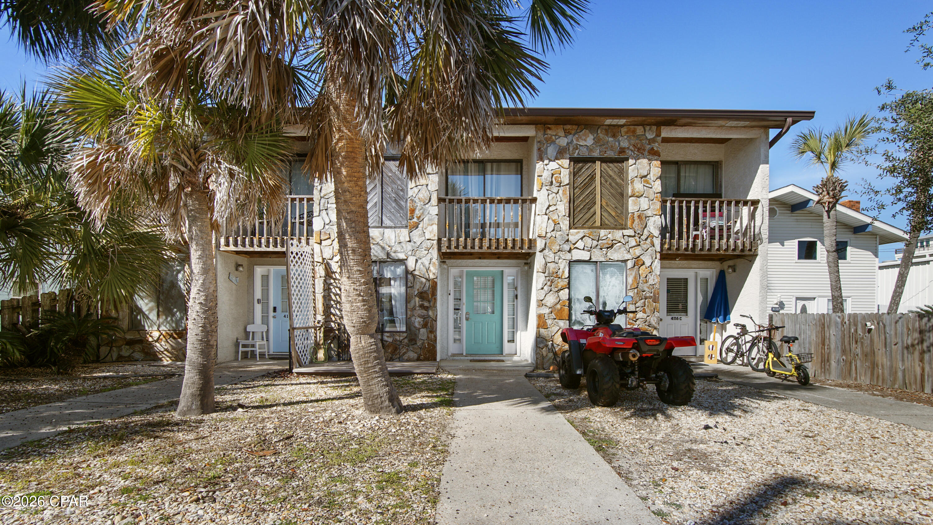 Just 350 feet from the beach, this irresistible coastal townhome invites you to live the laid-back seaside lifestyle you've been dreaming of. Sold fully furnished, turn-key, and with no HOA, it's ready for immediate enjoyment--simply arrive with your bathing suit and toothbrush. Inside, beach-cottage charm meets effortless comfort, with an open-concept living space, 2 bedrooms, 1 1/2 bathrooms, an oversized kitchen, and a cozy dining area perfect for relaxed gatherings after a day in the sun. The primary bedroom offers a serene retreat with generous closet space and a private balcony overlooking the backyard, while the guest bedroom features its own attached balcony for morning coffee or sunset breezes. With an additional half bath, outdoor laundry, and close proximity to sugar-white sand, dining, shopping, and local attractions, this property also shines as a highly desirable vacation rental, making it an ideal blend of personal getaway and income-producing coastal escape.