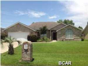 Hidden Pines 4 bedroom home in great condition! This home also has two full baths, and a wonderful great room with beamed cathedral ceilings, plus nice crown molding and gas fireplace and custom tile flooring. There is also floating laminate wood floors throughout the rest of the home. Split bedroom plan, formal dining room and large kitchen with plenty of cabinets and a breakfast nook. There is also a fully enclosed Florida room that is heated/cooled. Master suite is spacious and master bath has big walk in closet, double vanities, separate shower and whirlpool tub. Roomy laundry room with extra cabinets for storage. Backyard is privacy fenced, has big patio for relaxing. Yard is nicely landscaped and has sprinkler system on separate meter. Gas water heater, fireplace and hookup