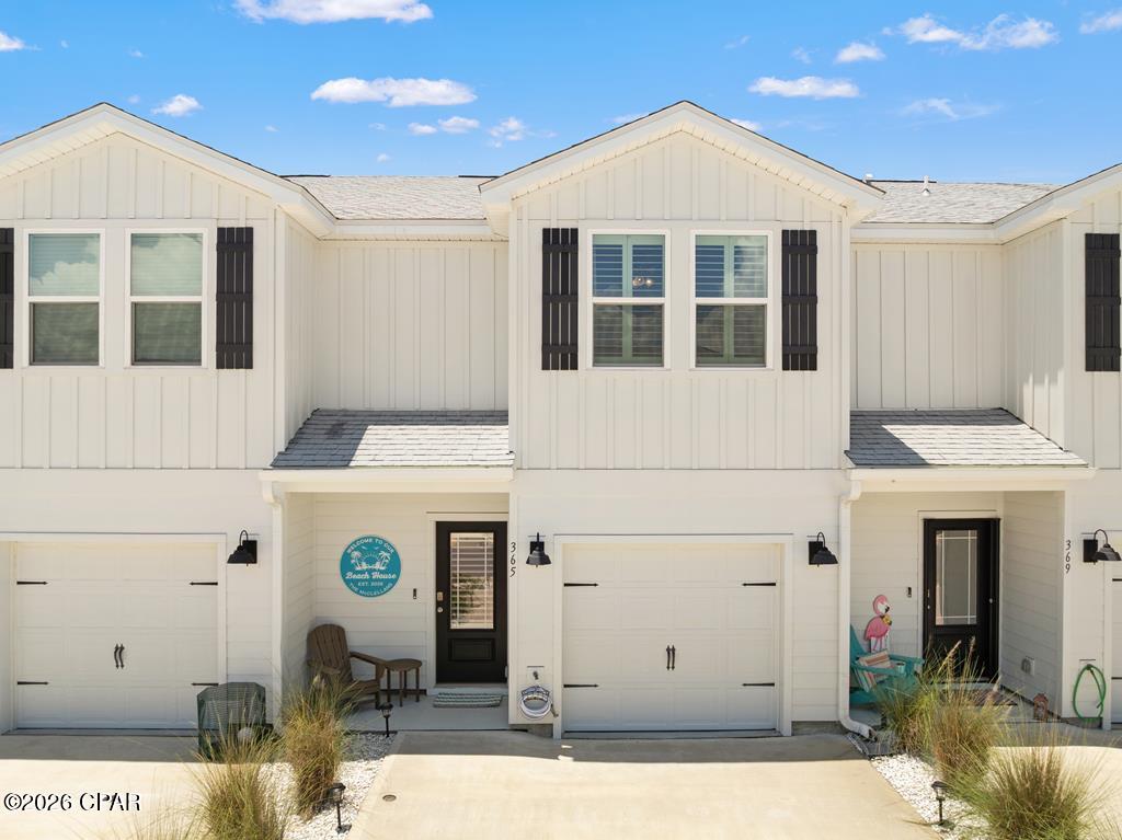 Welcome to 365 Salt Creek Lane, a 3BR/2.5BA townhome in Mexico Beach's Salt Creek community, now being offered fully furnished and completely turnkey. Built in 2024, this 1,460 sq ft home was constructed with quality and durability in mind, featuring Hardie Board siding, prairie-style doors, and 30-year dimensional shingles. Inside, you'll find LVP flooring throughout the main level, quartz countertops, white cabinetry with brushed-nickel hardware, stainless-steel appliances, and an open living and kitchen layout that feels bright and welcoming. Impact windows and doors provide both storm protection and energy efficiency, while the upgraded smart home system includes leak detection at the refrigerator and water heater for added peace of mind, whether you're there full-time or using it as a getaway. What truly sets this listing apart is the furnishings. Every single item inside is brand new, from the mattresses and Pottery Barn couch with Sunbrella stain-resistant fabric down to the cookware and dishes. Every piece was carefully selected from Fowhand Furniture and Pottery Barn, giving the home a high-end coastal vibe that is move-in ready from day one. The home also includes a top-of-the-line washer and dryer, a brand-new grill, Polywood front and back porch furniture, and custom wood shutters on all doors and windows. An attached garage and a low quarterly HOA covering grounds maintenance make ownership easy and stress-free. Just minutes from the only beach access that allows dogs and bonfires in Mexico Beach, and a short drive to the boat ramp(2 minutes), this one checks all the boxes. Call today!